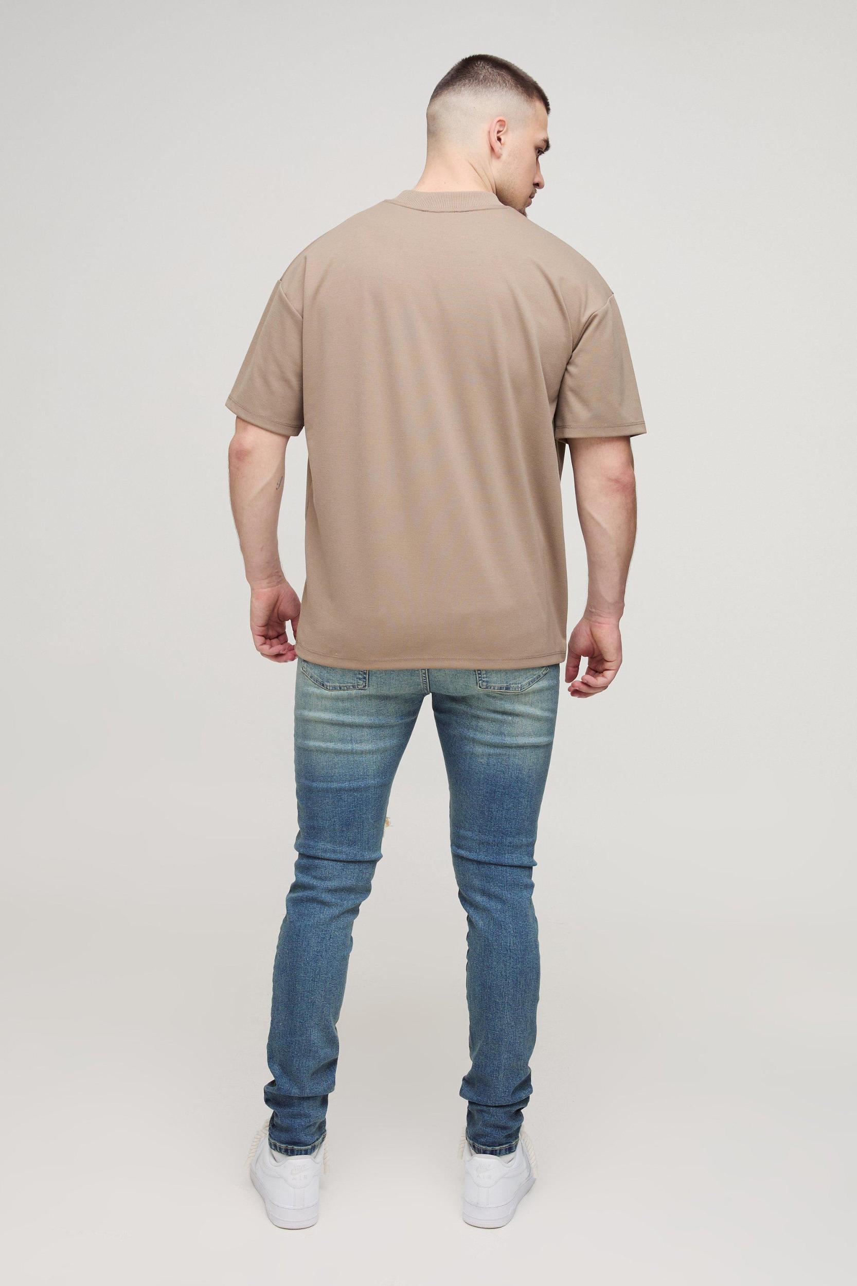 Tall Extreme Rip Busted Knee Skinny Jeans | boohooMAN USA Product Image