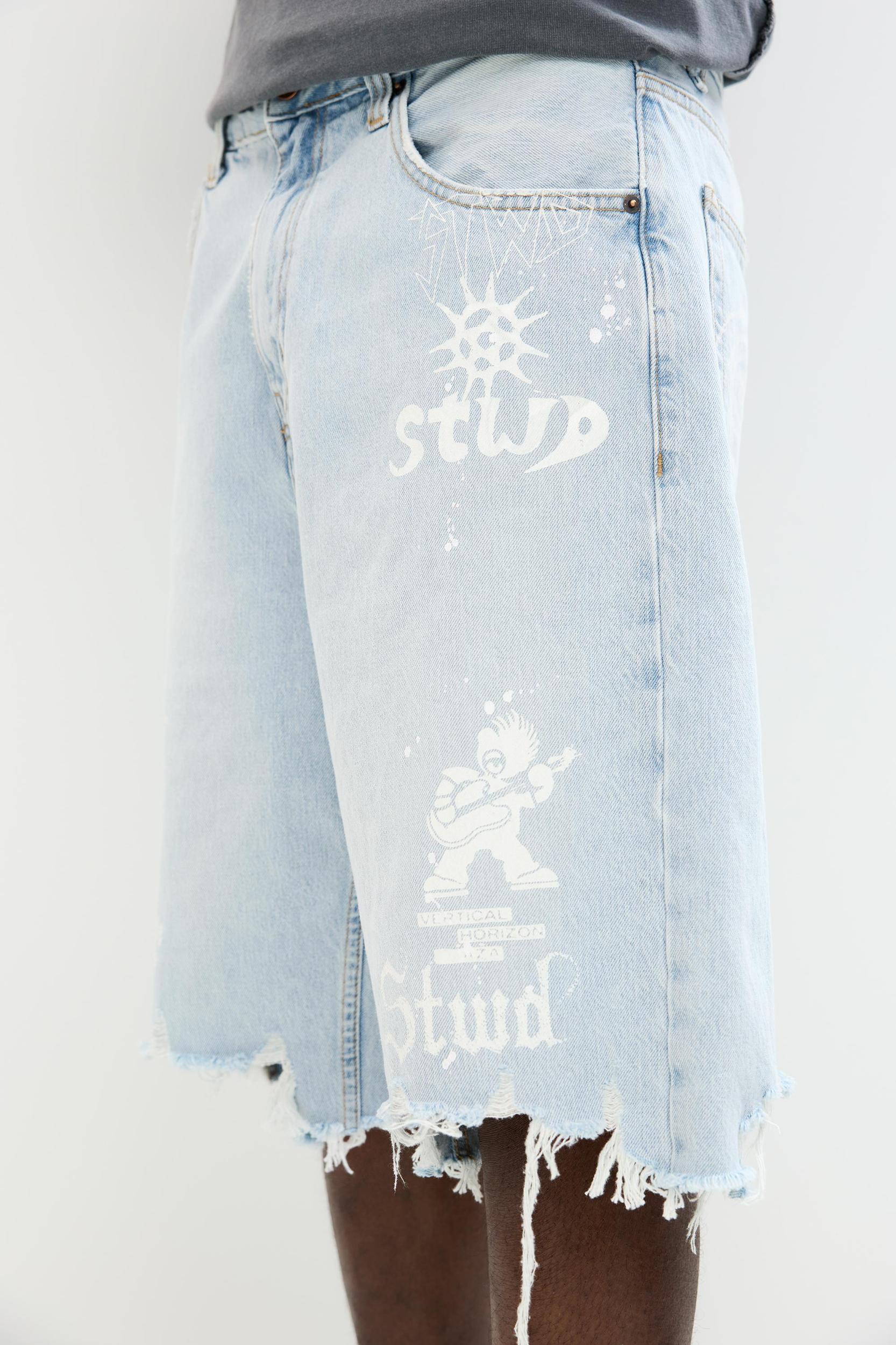 Ripped denim Bermuda shorts Product Image