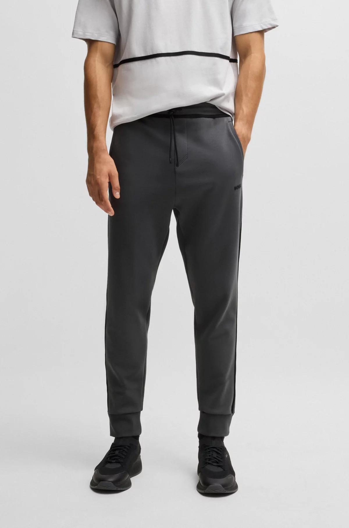 Tracksuit bottoms with tape and logo Product Image