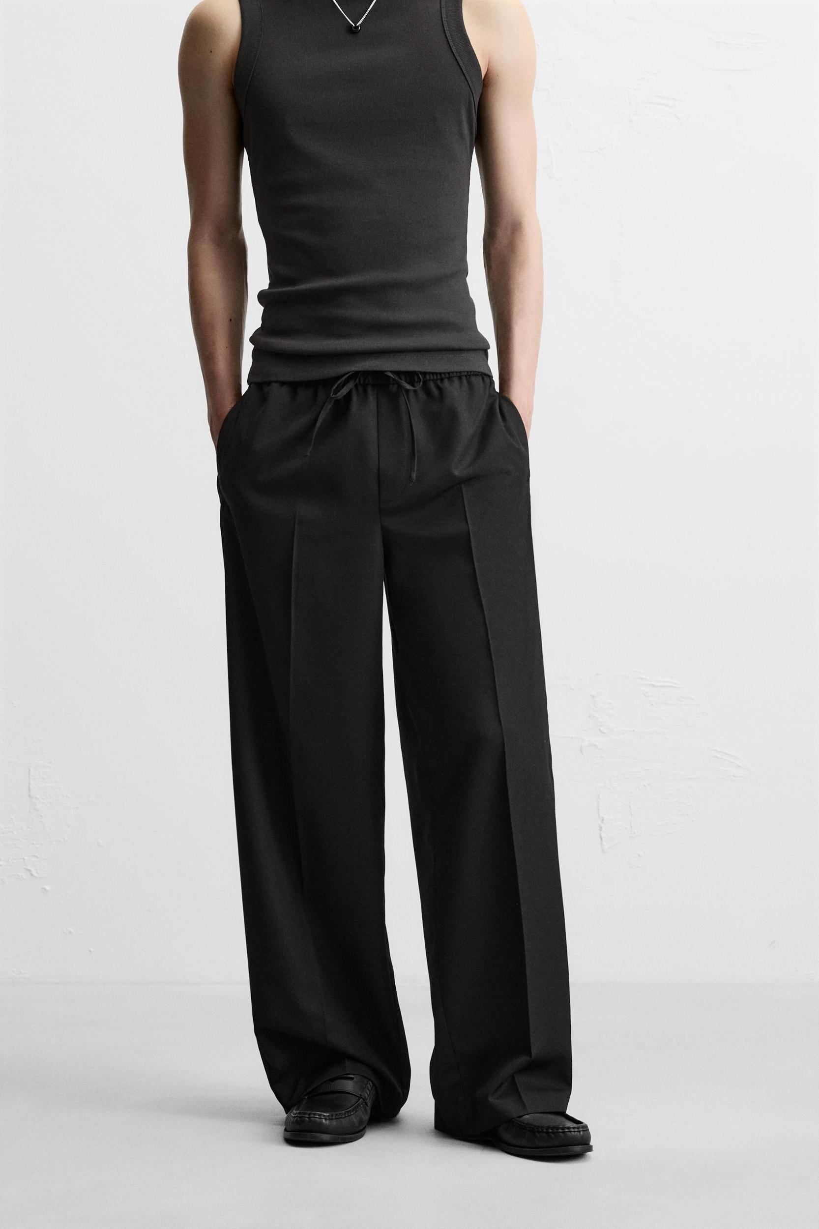 RELAXED FIT PANTS WITH STRIPE Product Image