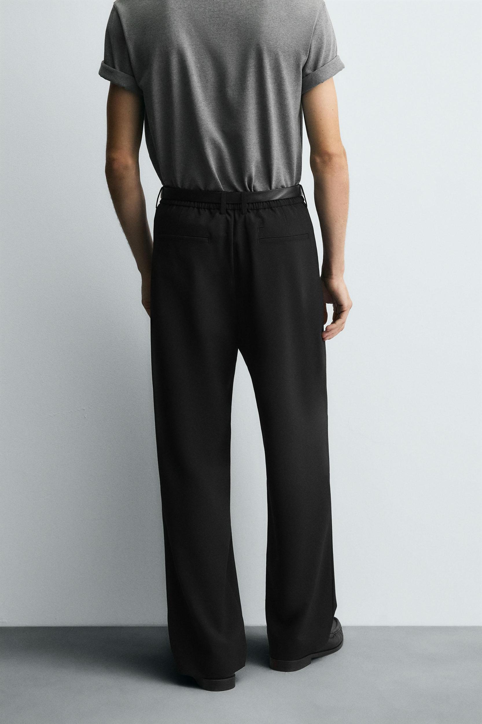 PLEATED WIDE FIT PANTS Product Image