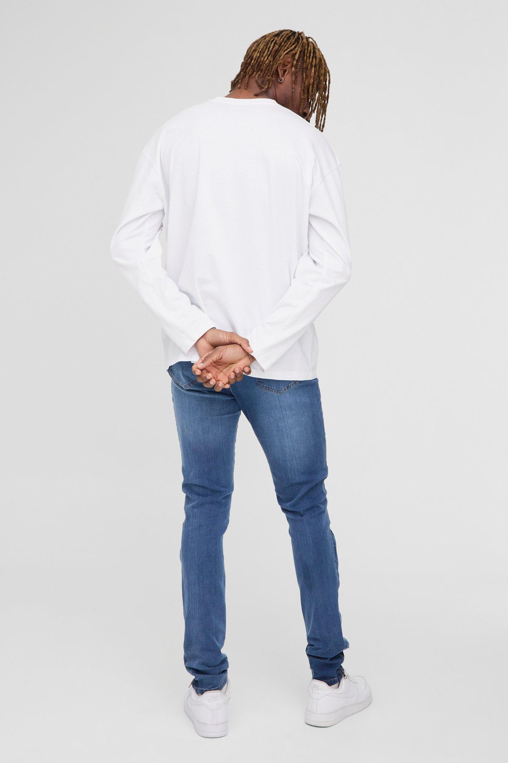 Tall Stretch Skinny Zip Hem Ripped Jeans | boohooMAN USA Product Image