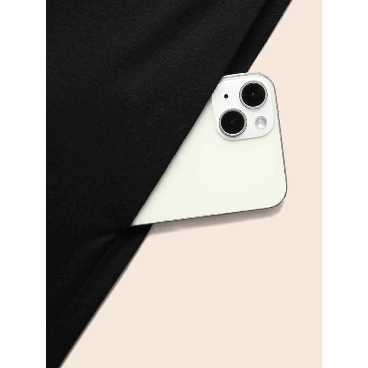 Plus Size Black Overlap Collar Metal Detail Belted Jumpsuit Women Elegant Sleeveless Overlap Collar Everyday Loose Jumpsuits BloomChic 18-20/2X Product Image