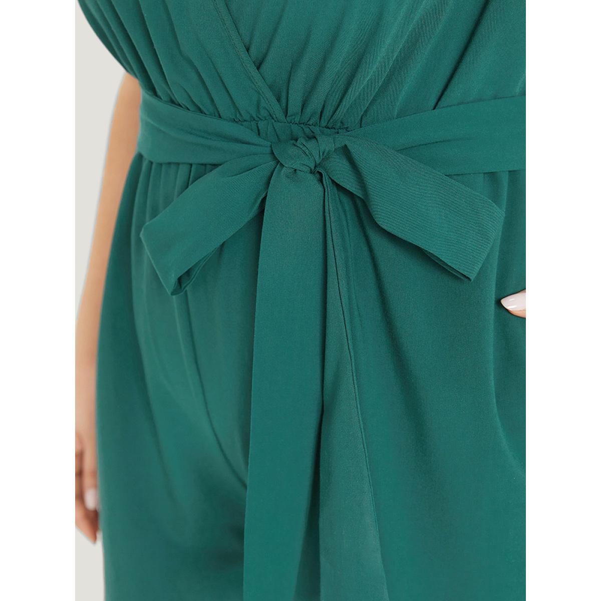 Plus Size Green Supersoft Essentials Plain Surplice Neck Belted Jumpsuit Women Elegant Sleeveless V-neck Dailywear Loose Jumpsuits BloomChic 26/4X Product Image