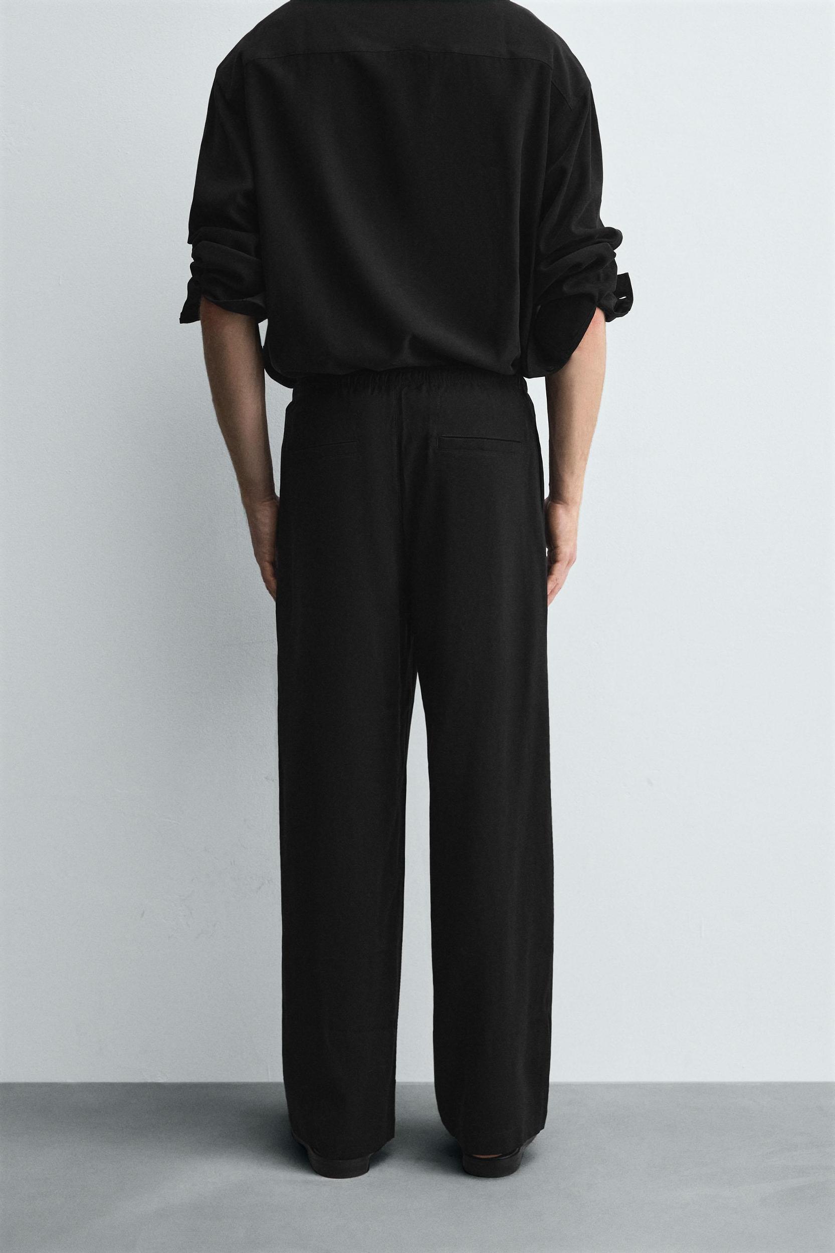 RELAXED FIT FLOWY PANTS Product Image