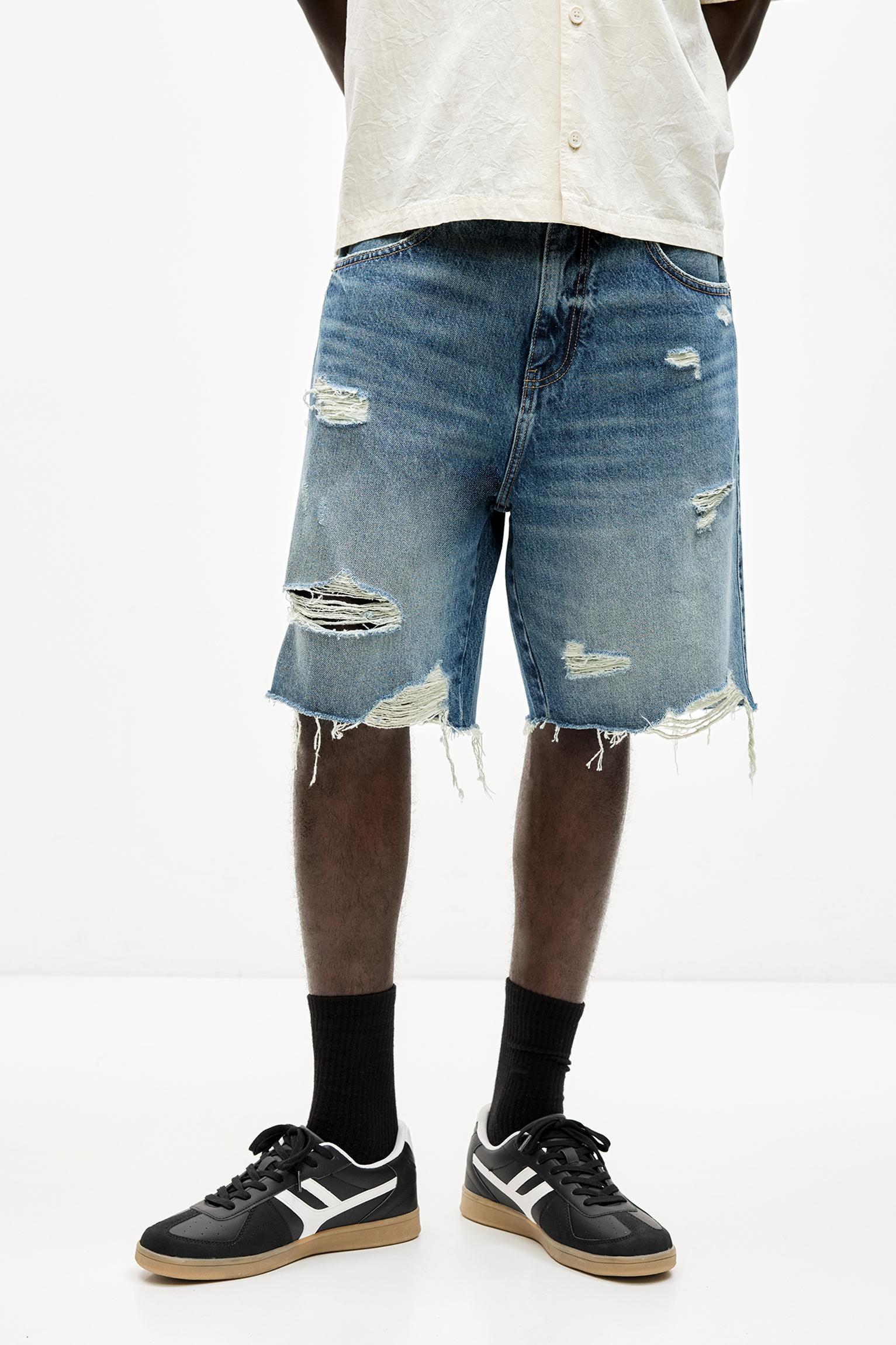 Ripped straight fit denim Bermuda shorts Product Image