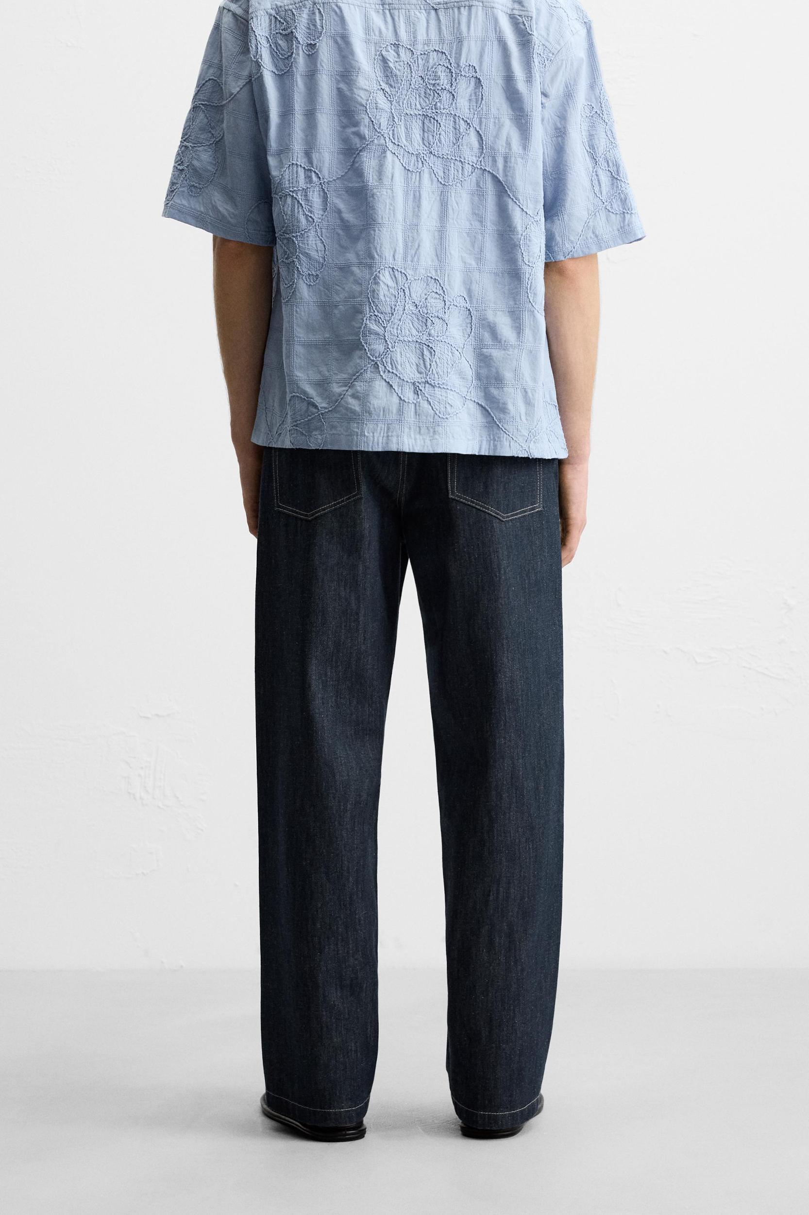 STRAIGHT FIT BELTED JEANS Product Image