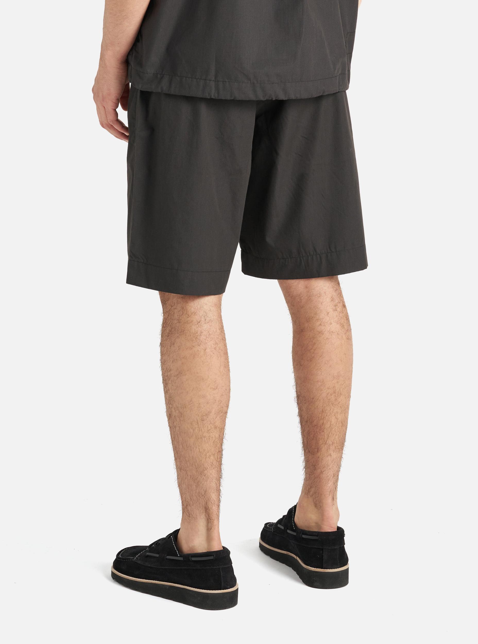Universal Works Pleated Track Short in Black Recycled Polytech Product Image