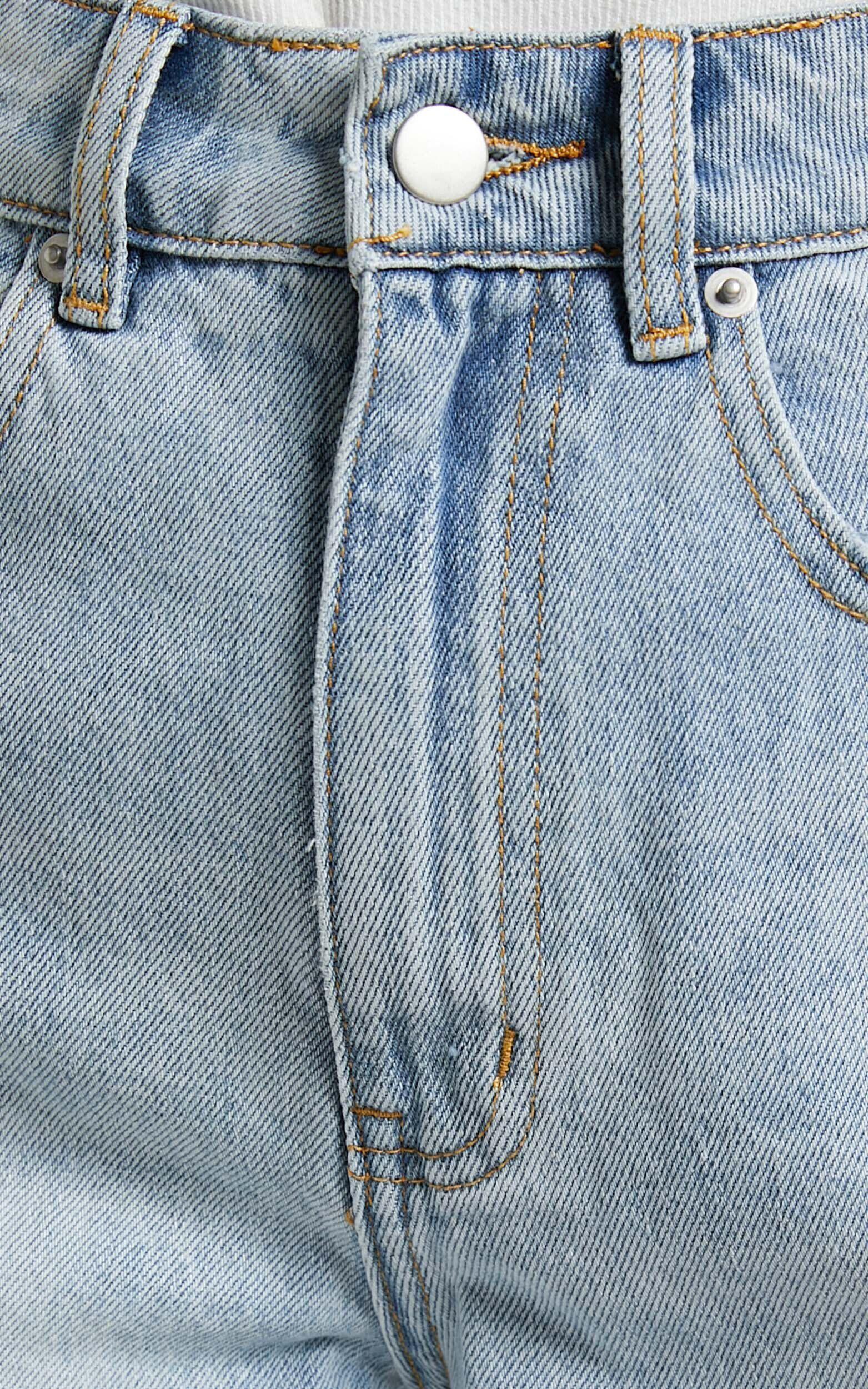 Eloisa Shorts - Recycled Cotton Raw Hem Denim Shorts in Mid Blue Wash Product Image