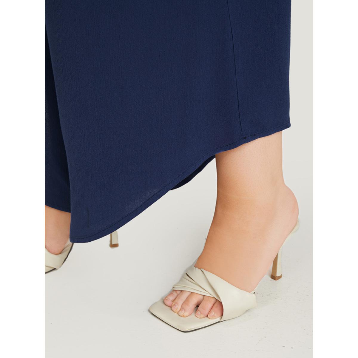 Plus Size Solid Paperbag Waist Asymmetrical Hem Wide Leg Pants Women Indigo Elegant High Rise Dailywear Pants BloomChic 12/L Product Image