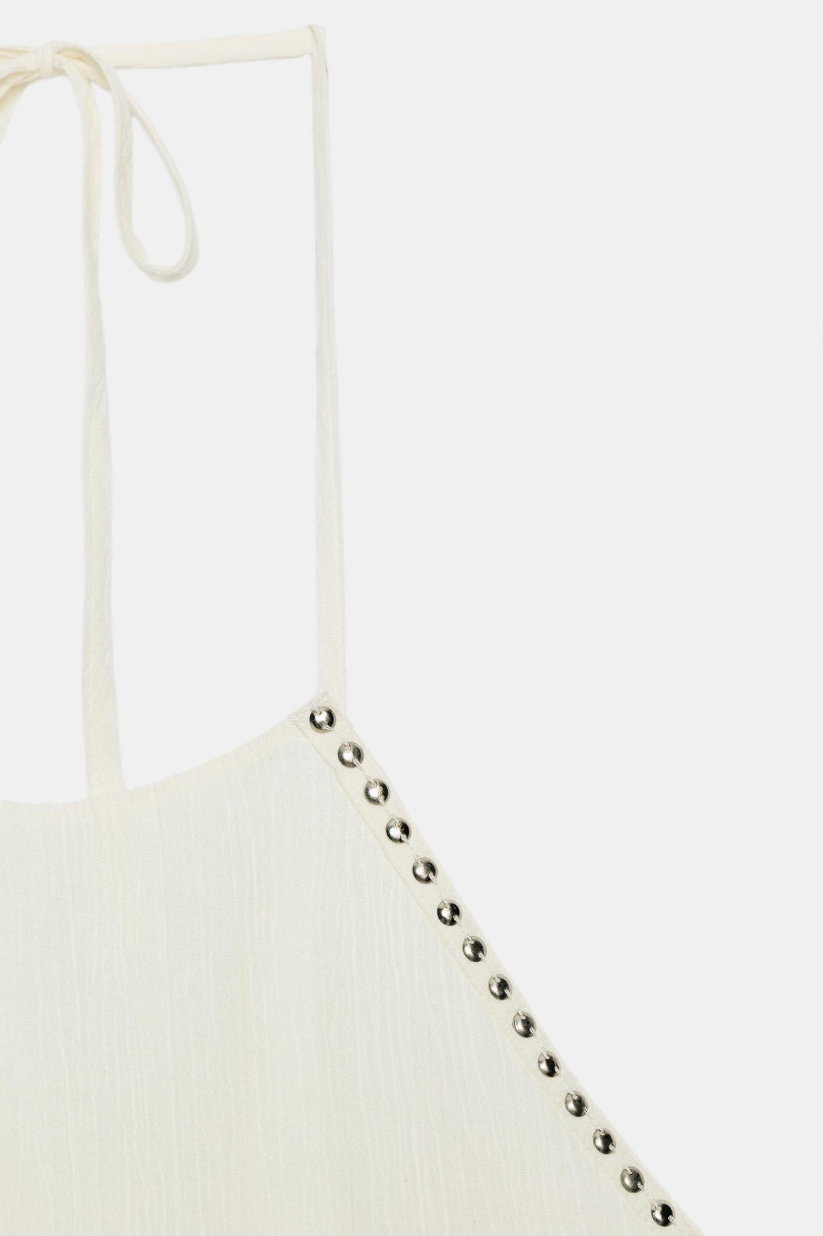STUDDED RUFFLE HALTER TOP Product Image