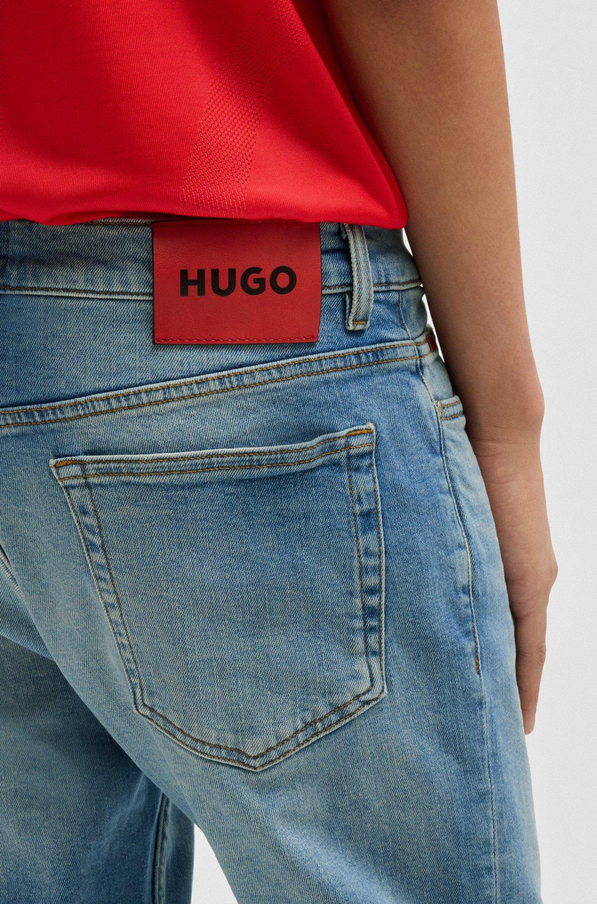 Slim-fit jeans in mid-blue stretch denim Product Image