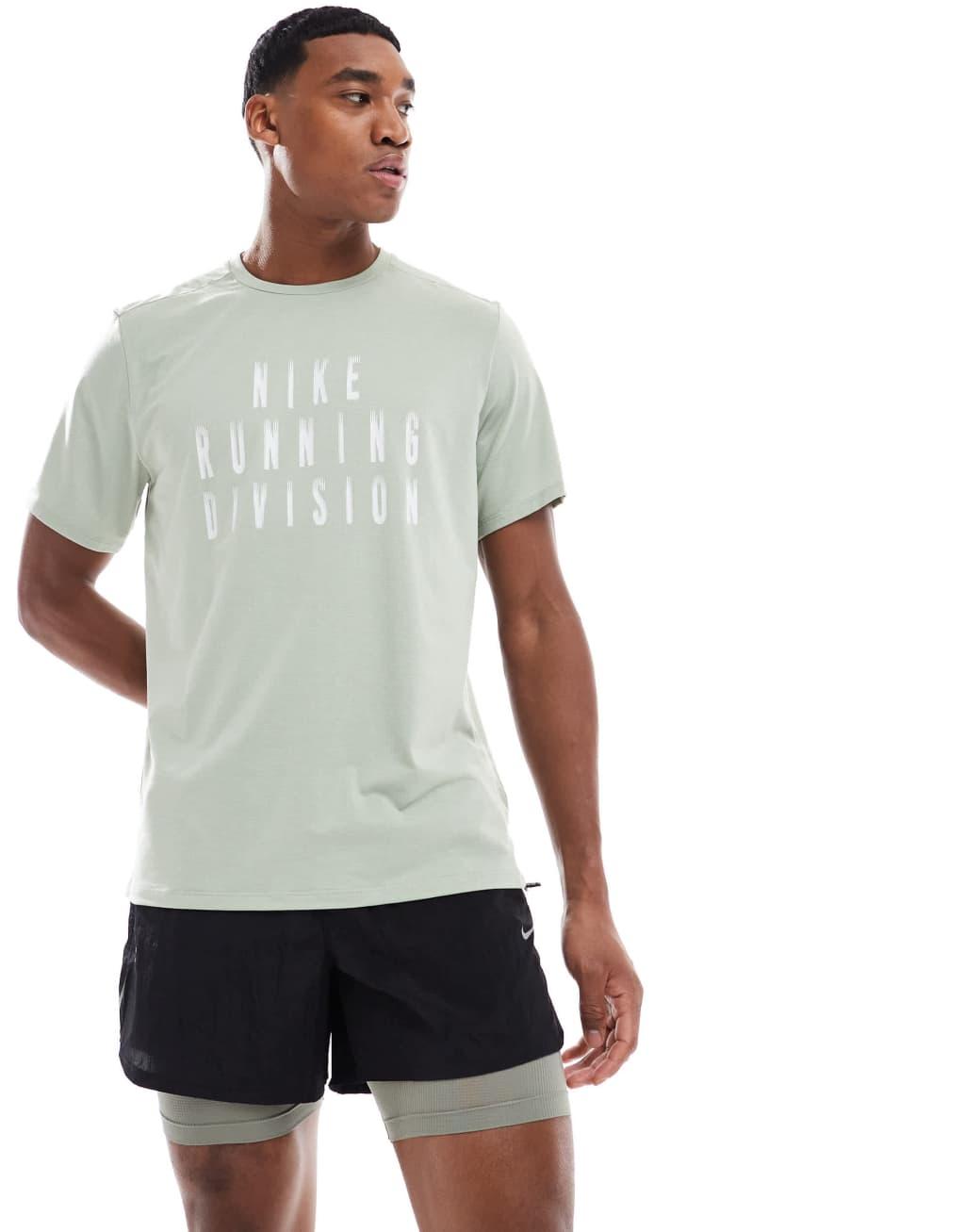 Nike Running Run Division Stride 5 inch 2 in 1 shorts in black Product Image