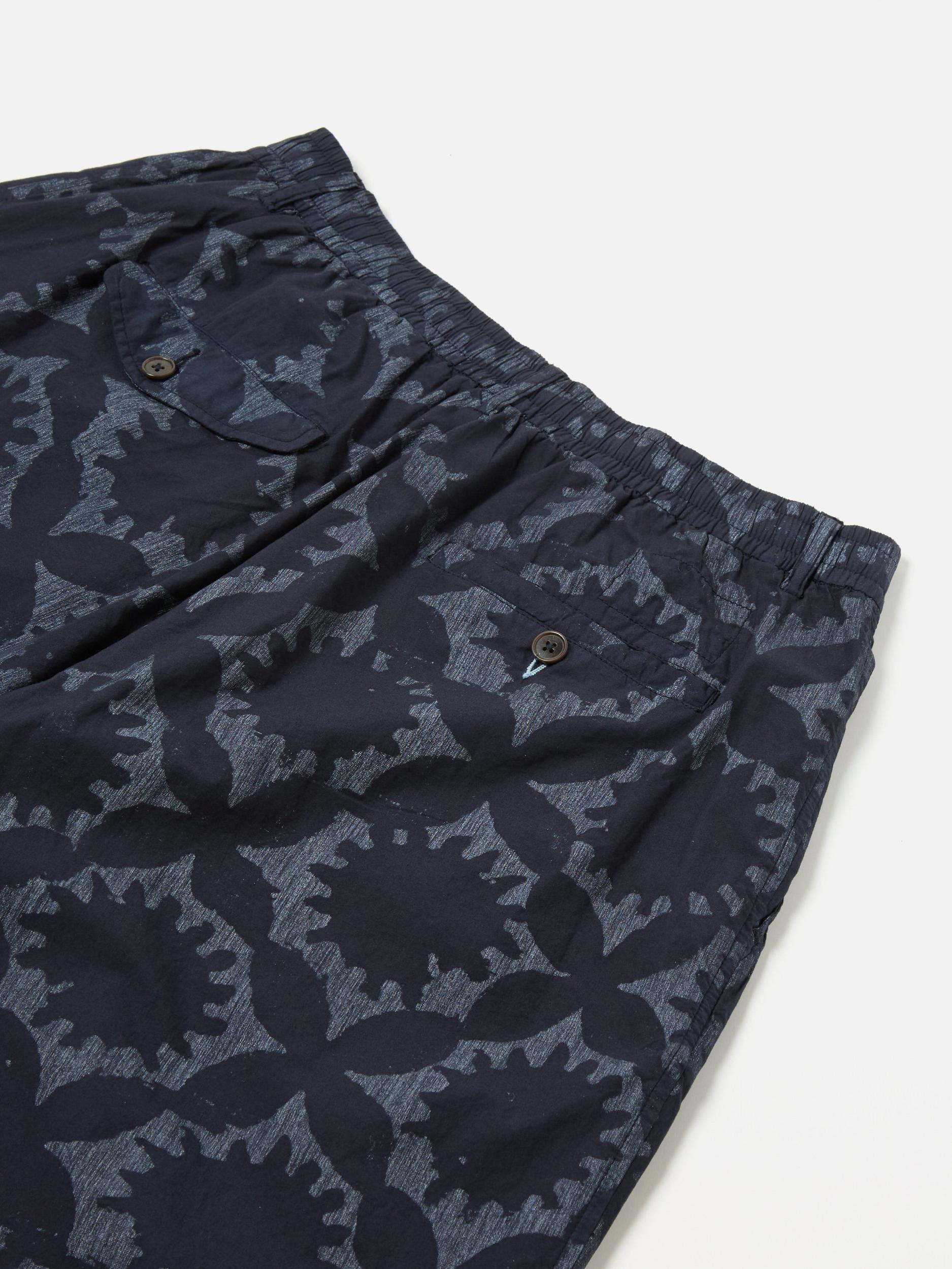 Universal Works Pleated Track Short in Navy Over Dyed Sun Print Product Image