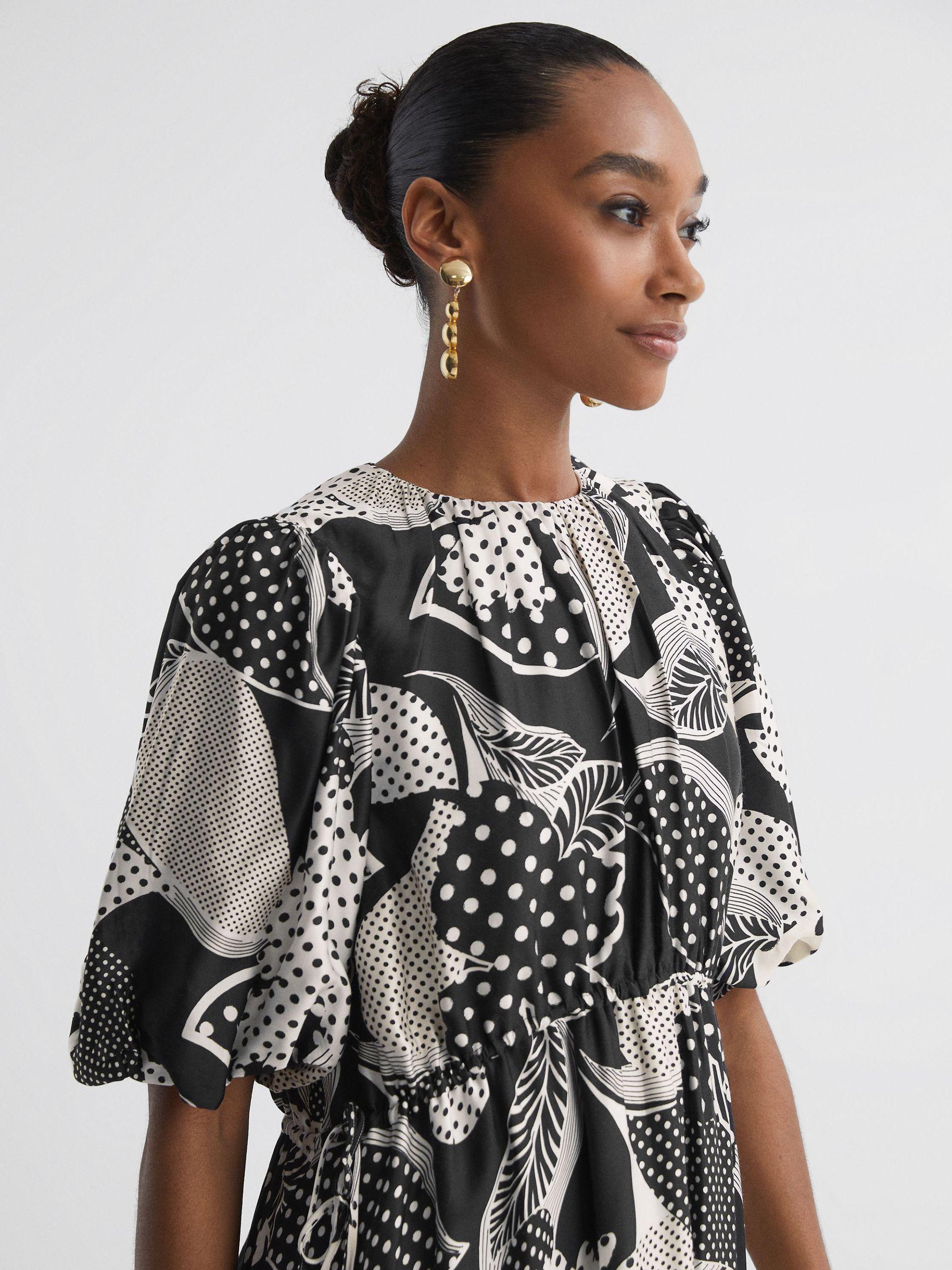 Florere Polka Dot Puff Sleeve Mini Dress in Black Product Image