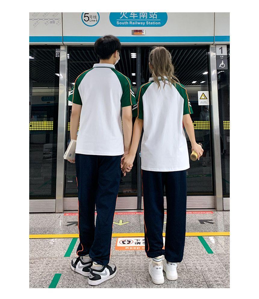 Couple Matching Crew Neck Striped Button Baseball Jacket / Harem Sweatpants / Short-Sleeve Striped Polo Shirt Product Image