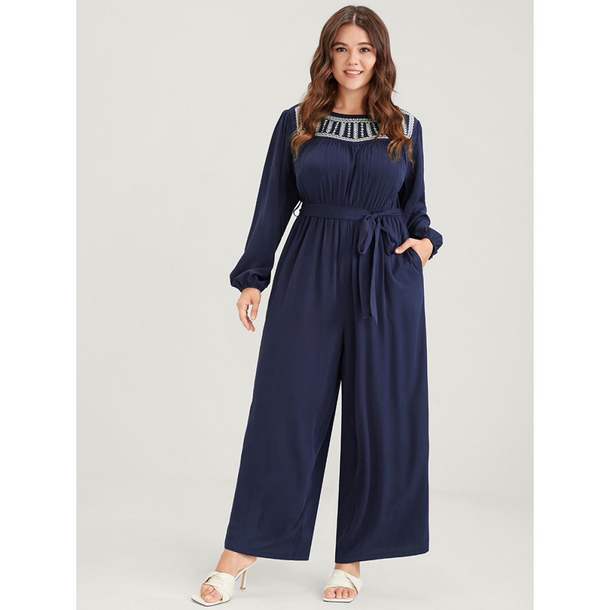 Plus Size DarkBlue Solid Pocket Lantern Sleeve Embroidered Belted Jumpsuit Women Elegant Long Sleeve Round Neck Dailywear Loose Jumpsuits BloomChic 14-16/1X Product Image