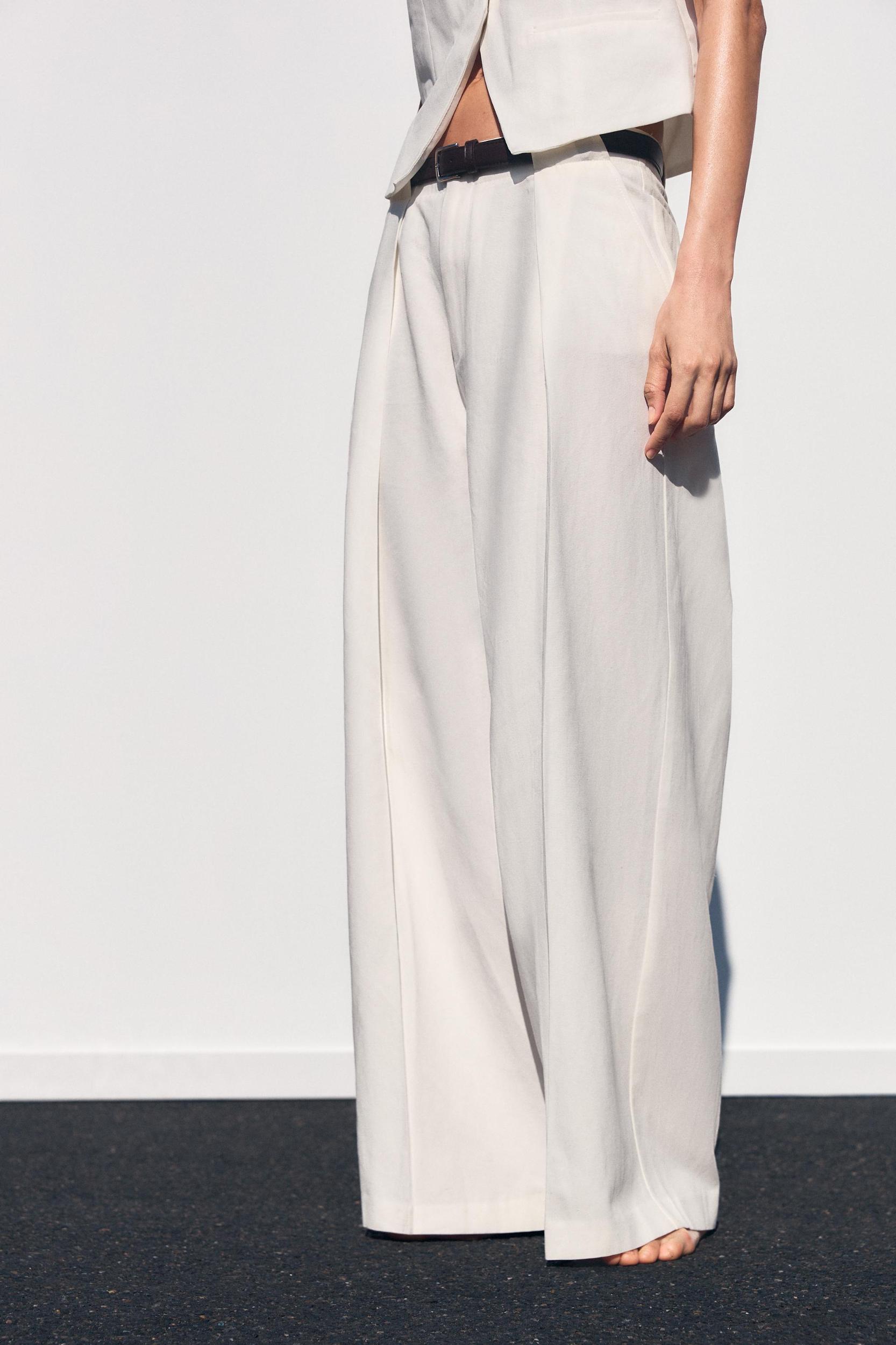 BELTED PLEATED PANTS Product Image