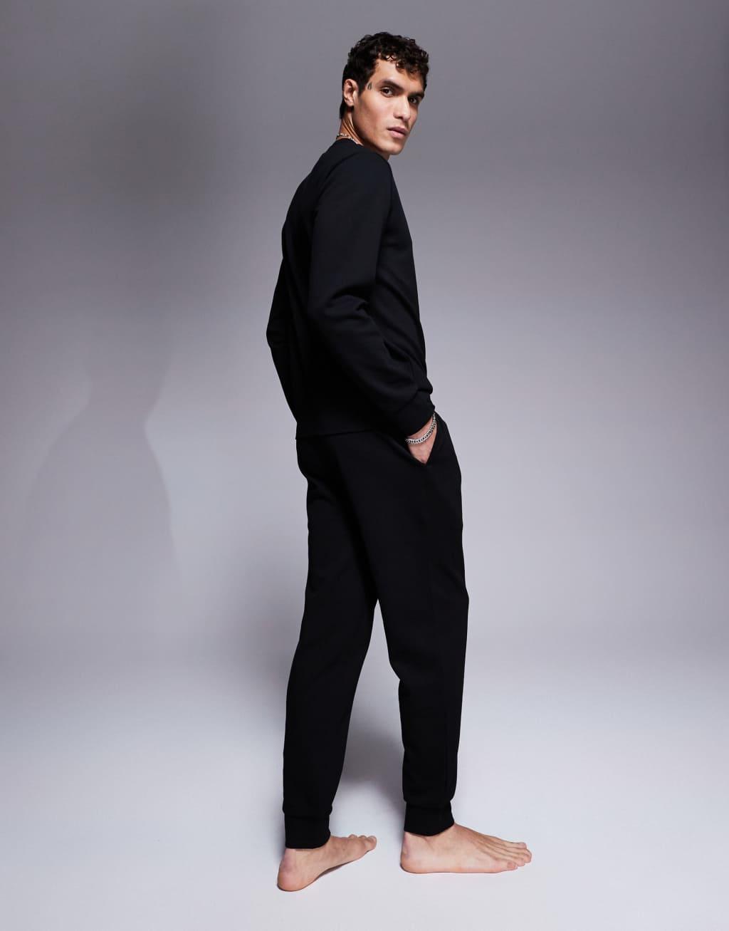 Emporio Armani Bodywear crew neck textured sweatpants in black - part of a set  Product Image