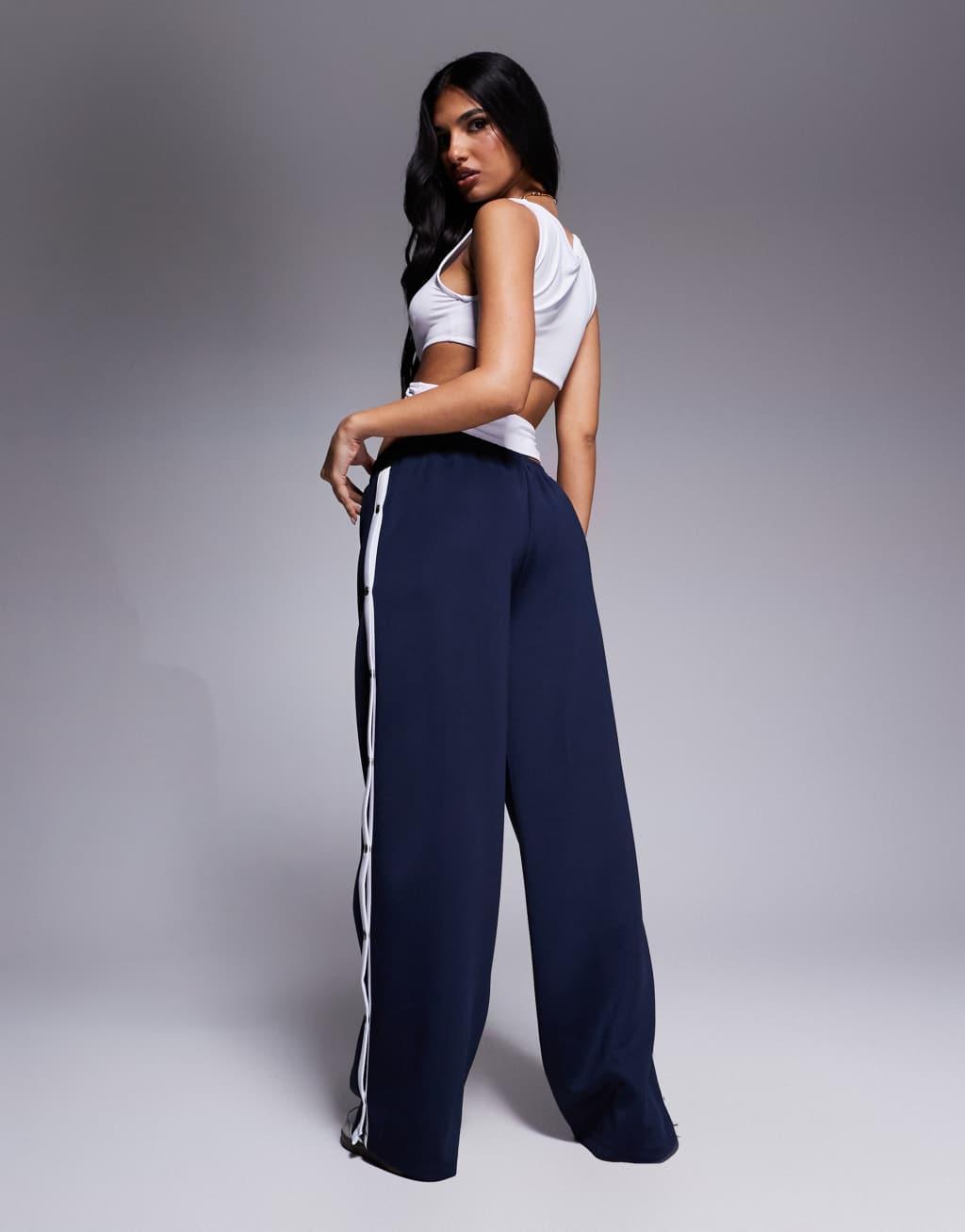 ASOS DESIGN wide leg pants with stripe and snaps in navy Product Image
