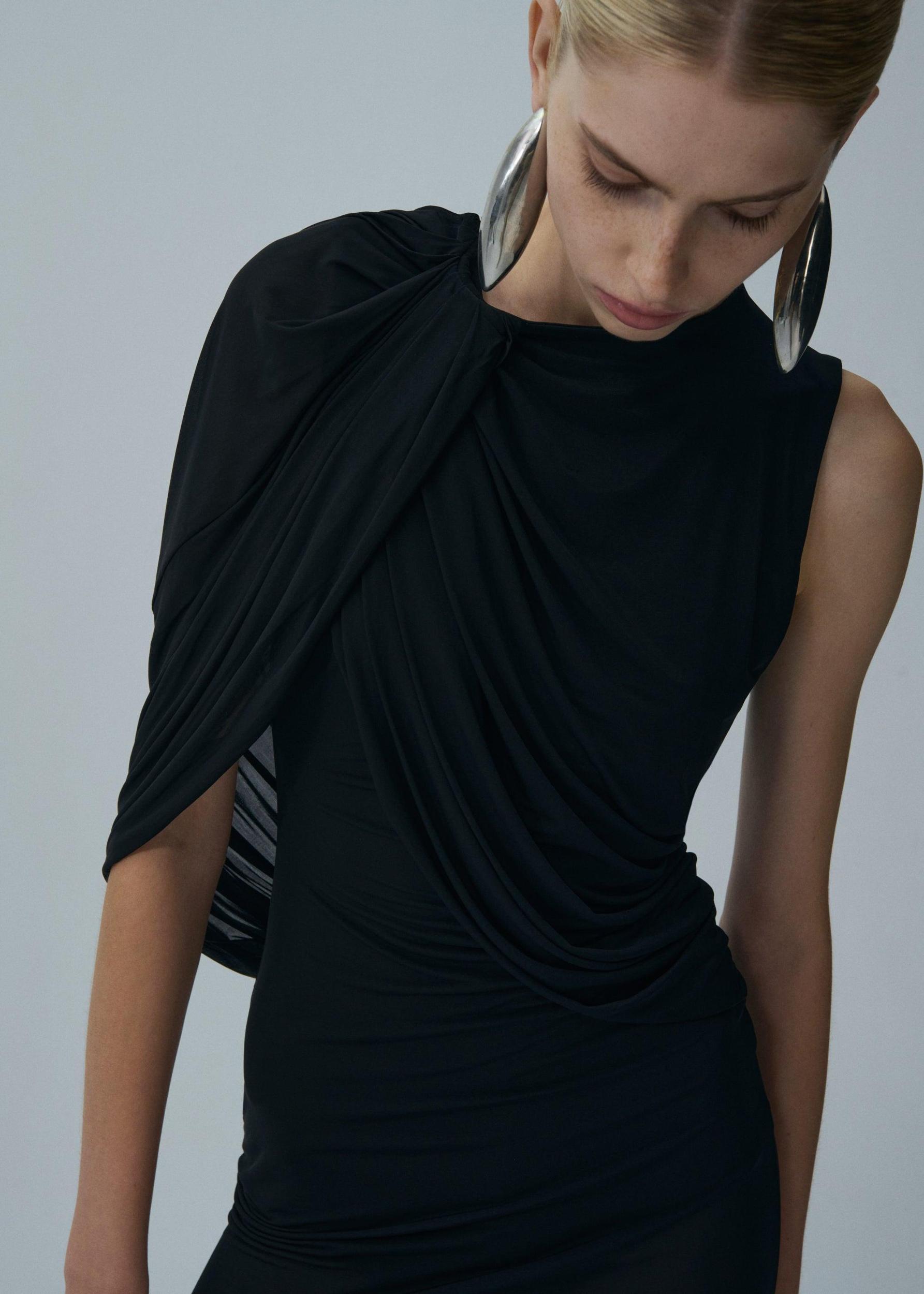 Asymmetrical draped midi dress in black Product Image