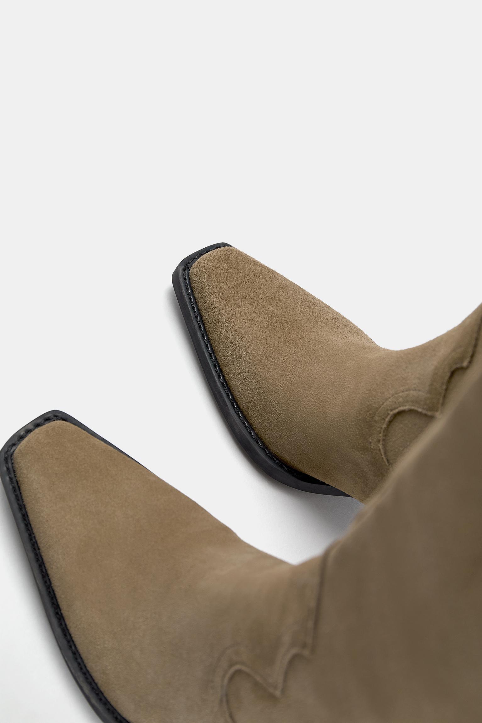 Leather knee-high cowboy-style boots Product Image