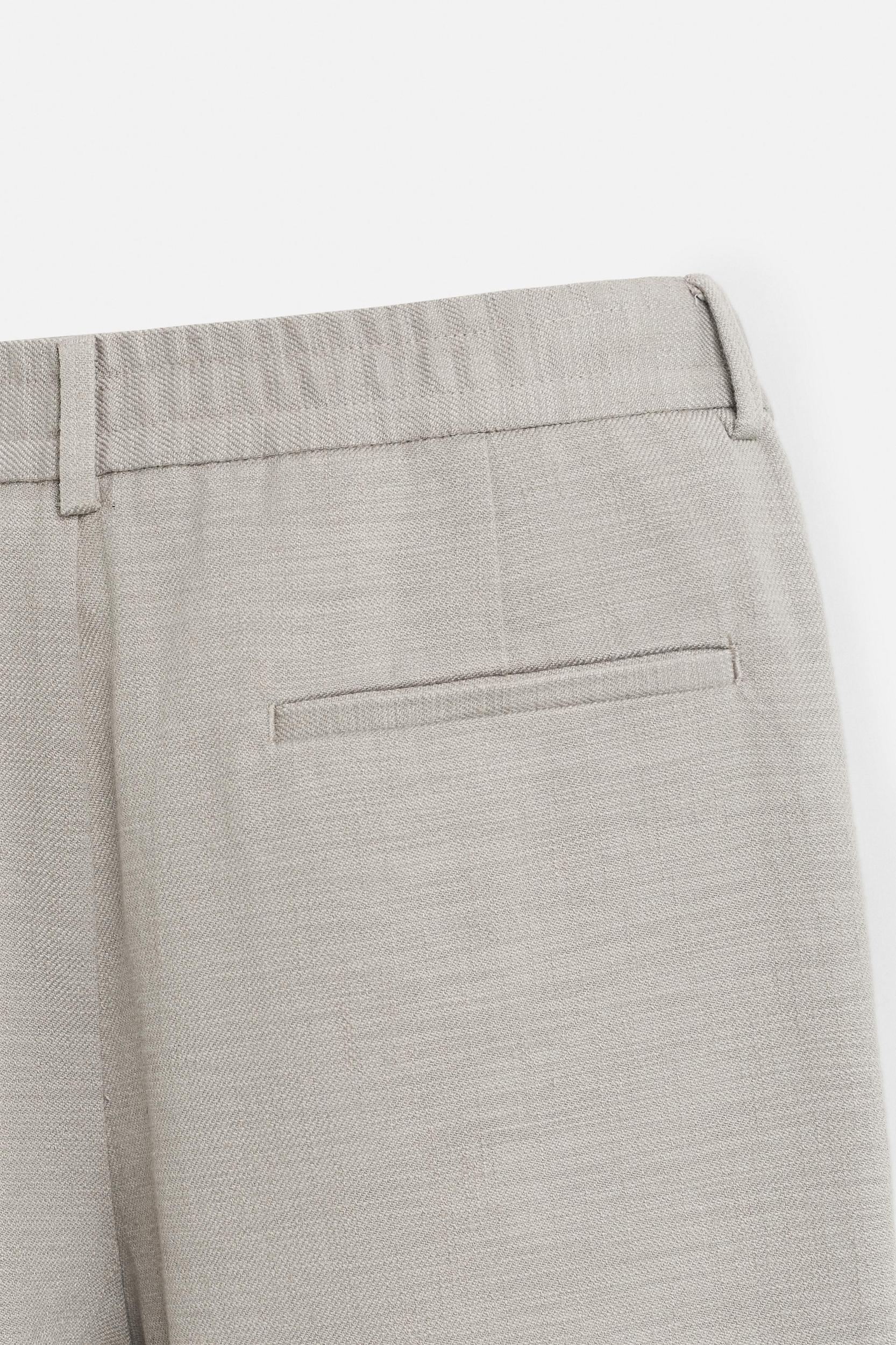 TEXTURED REGULAR FIT PANTS Product Image