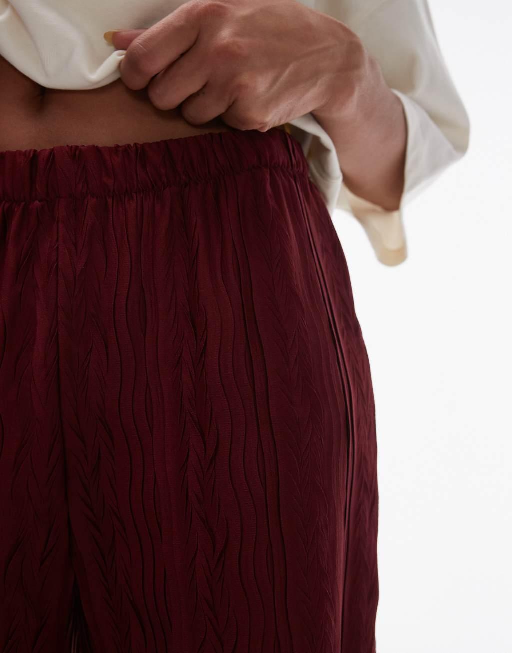 Topshop crinkle plisse wide leg pants in burgundy Product Image