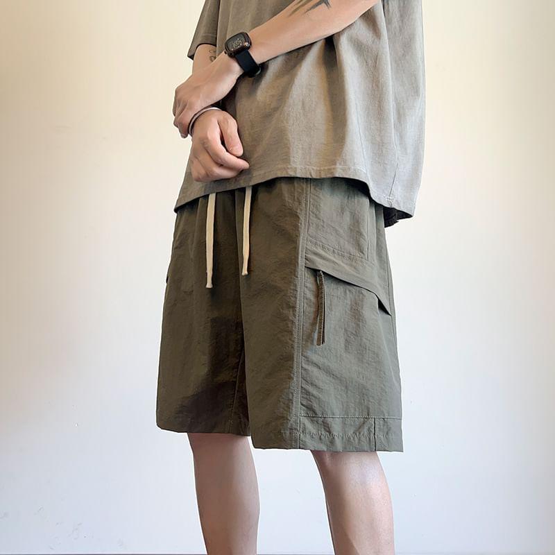 Drawstring Waist Plain Cargo Shorts / Short-Sleeve Round Neck T-Shirt Product Image