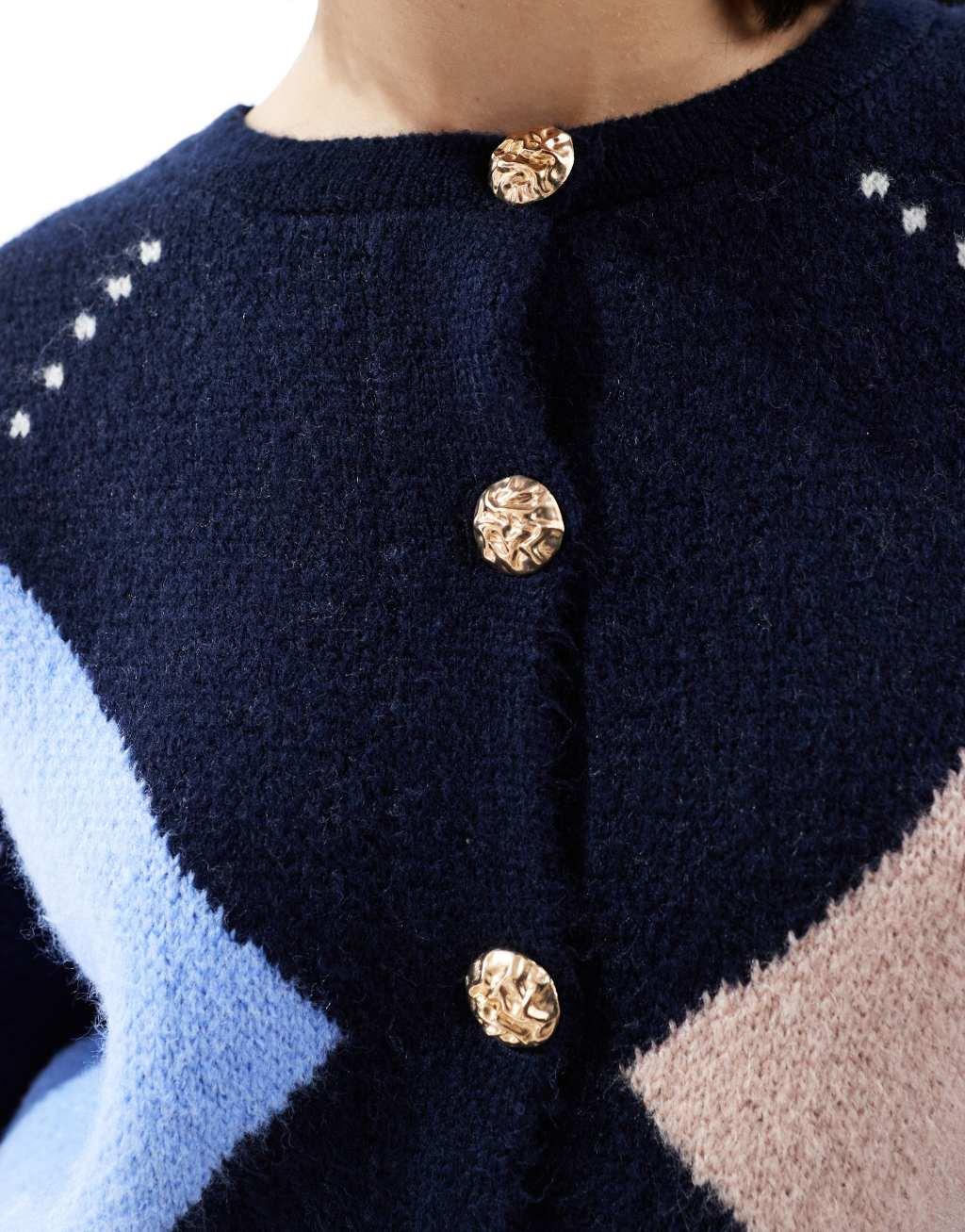 ASOS DESIGN knitted crew neck cardigan with gold button in navy argyle pattern Product Image