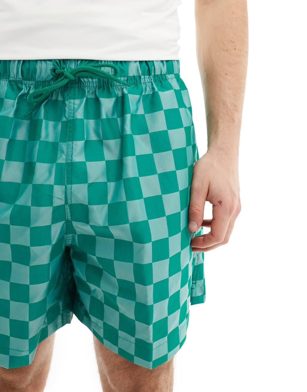 Nike Club checkerboard shorts in green Product Image