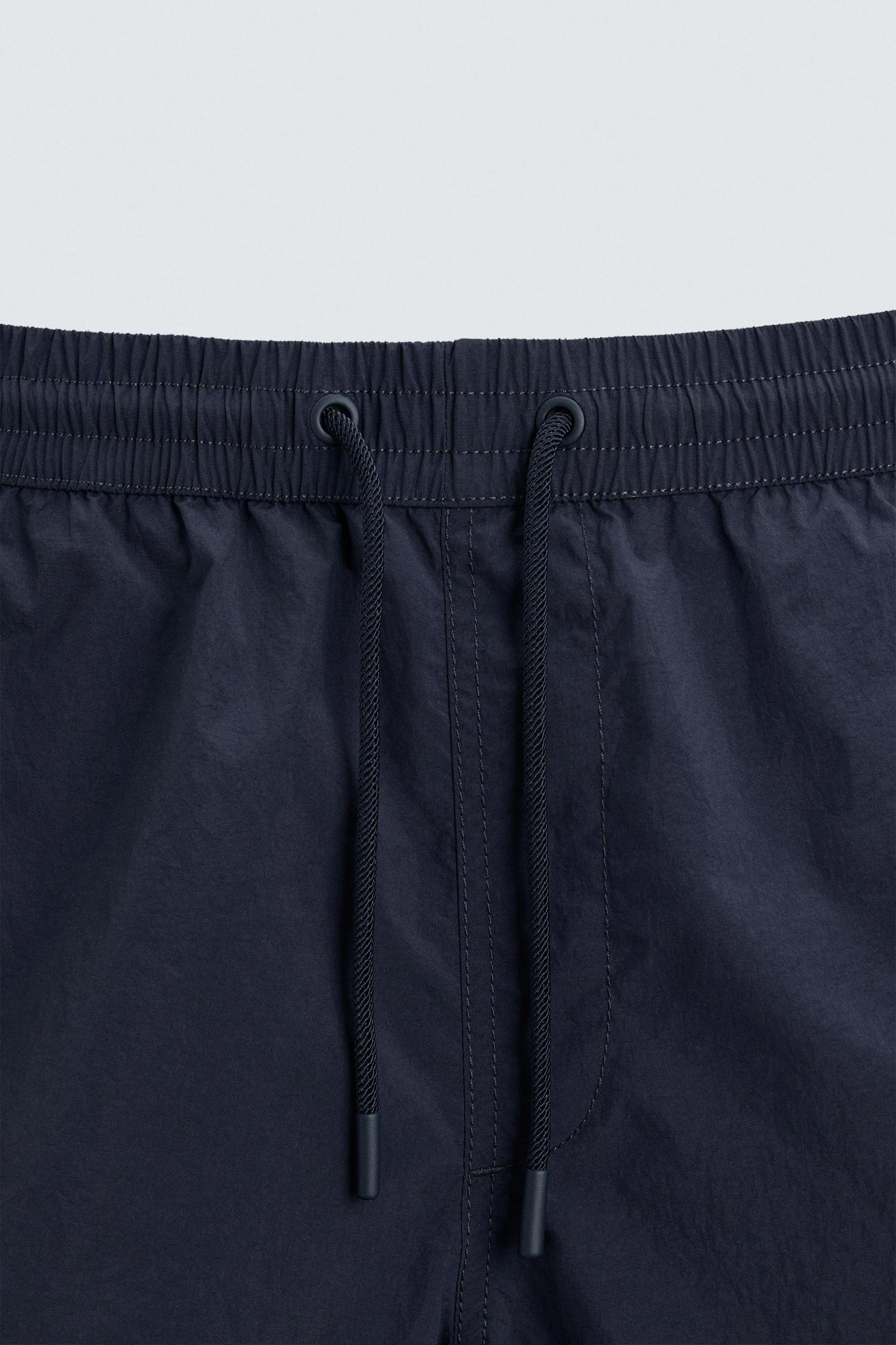 BASIC MID-LENGTH SWIMSUIT Product Image