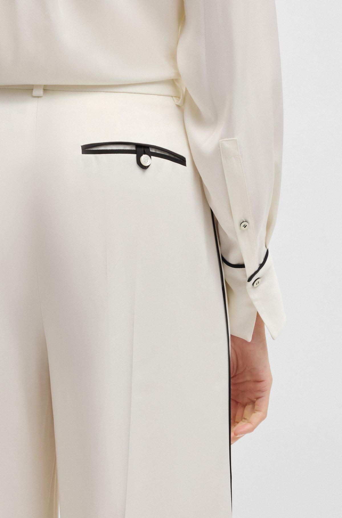 Relaxed-fit trousers with a wide leg Product Image