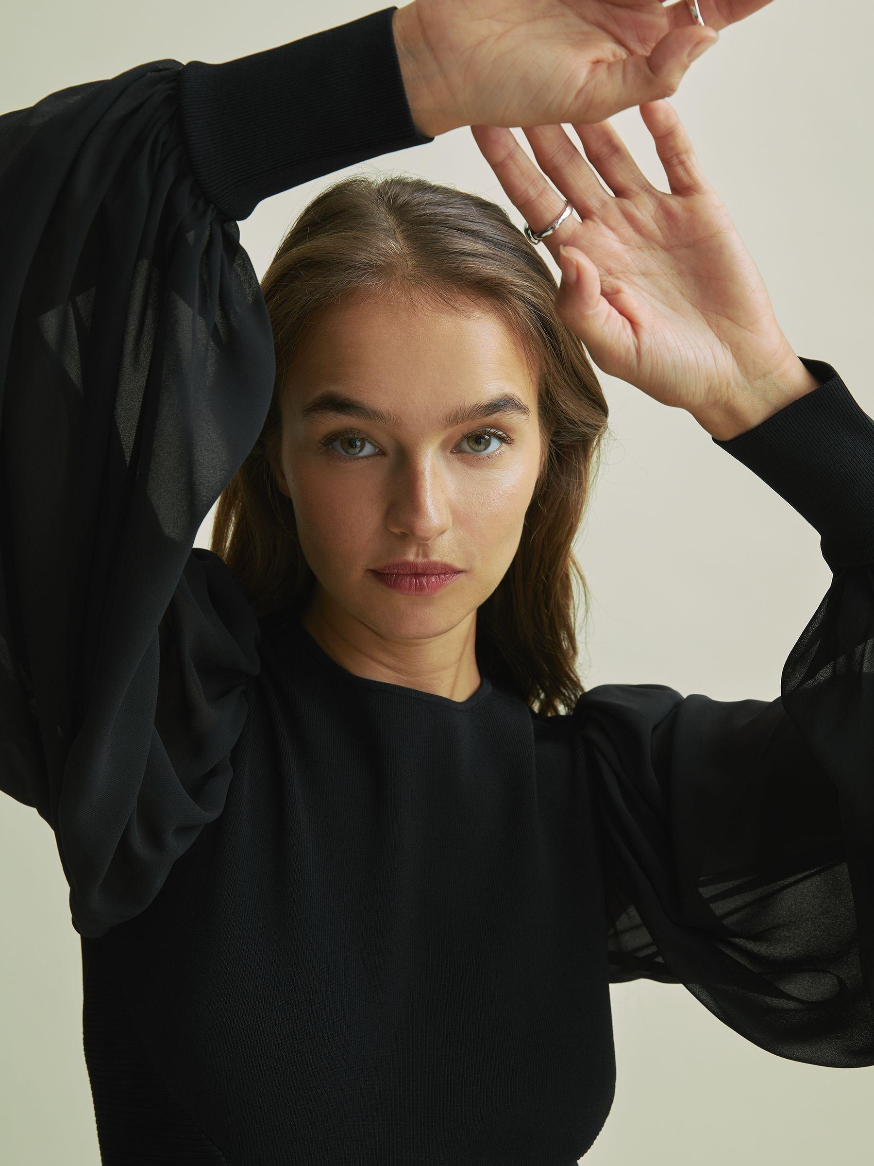 Florere Hybrid Knit Sheer Sleeve Black Top in Black Product Image