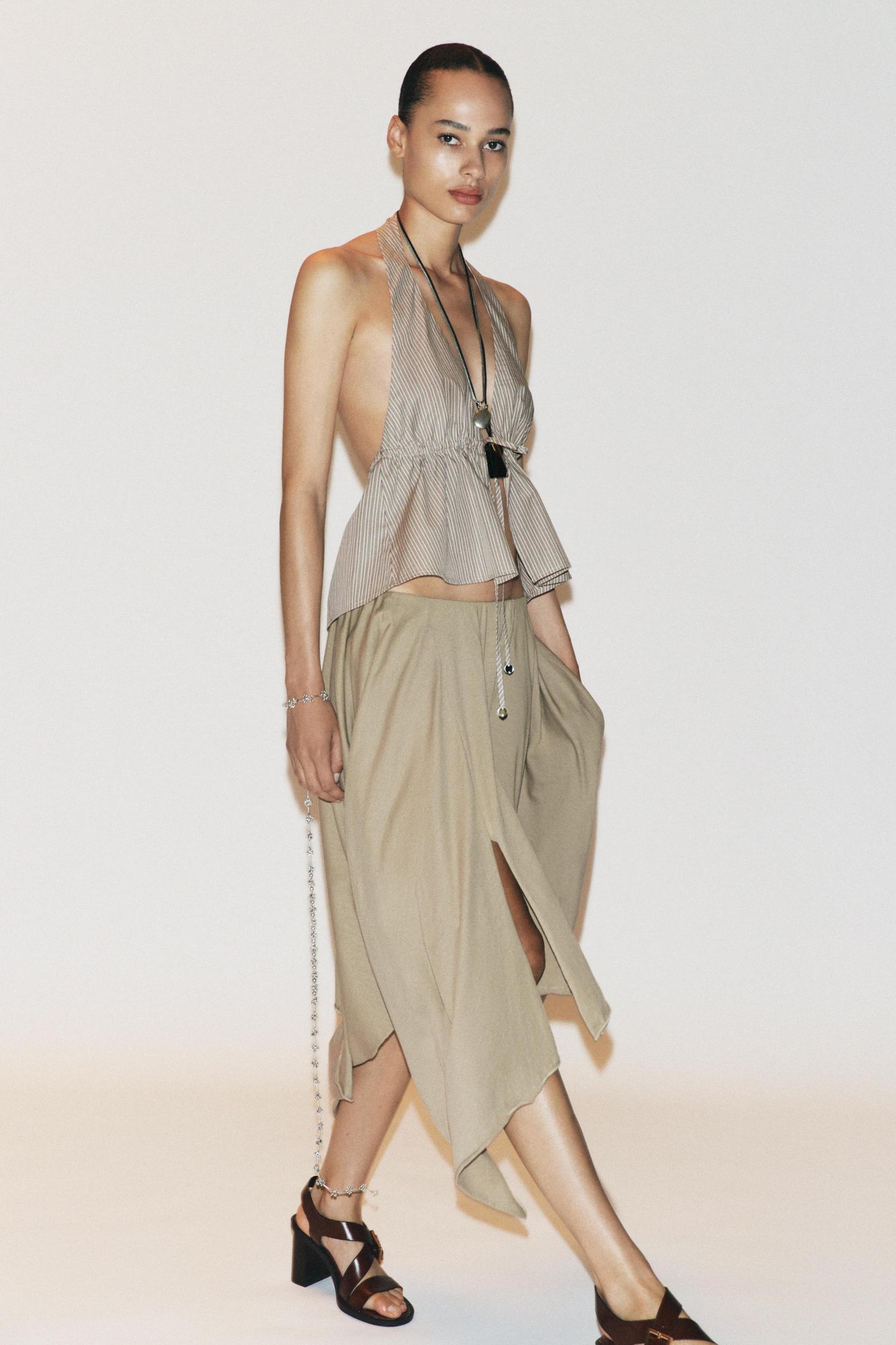 ASYMMETRIC MIDI SKIRT Product Image