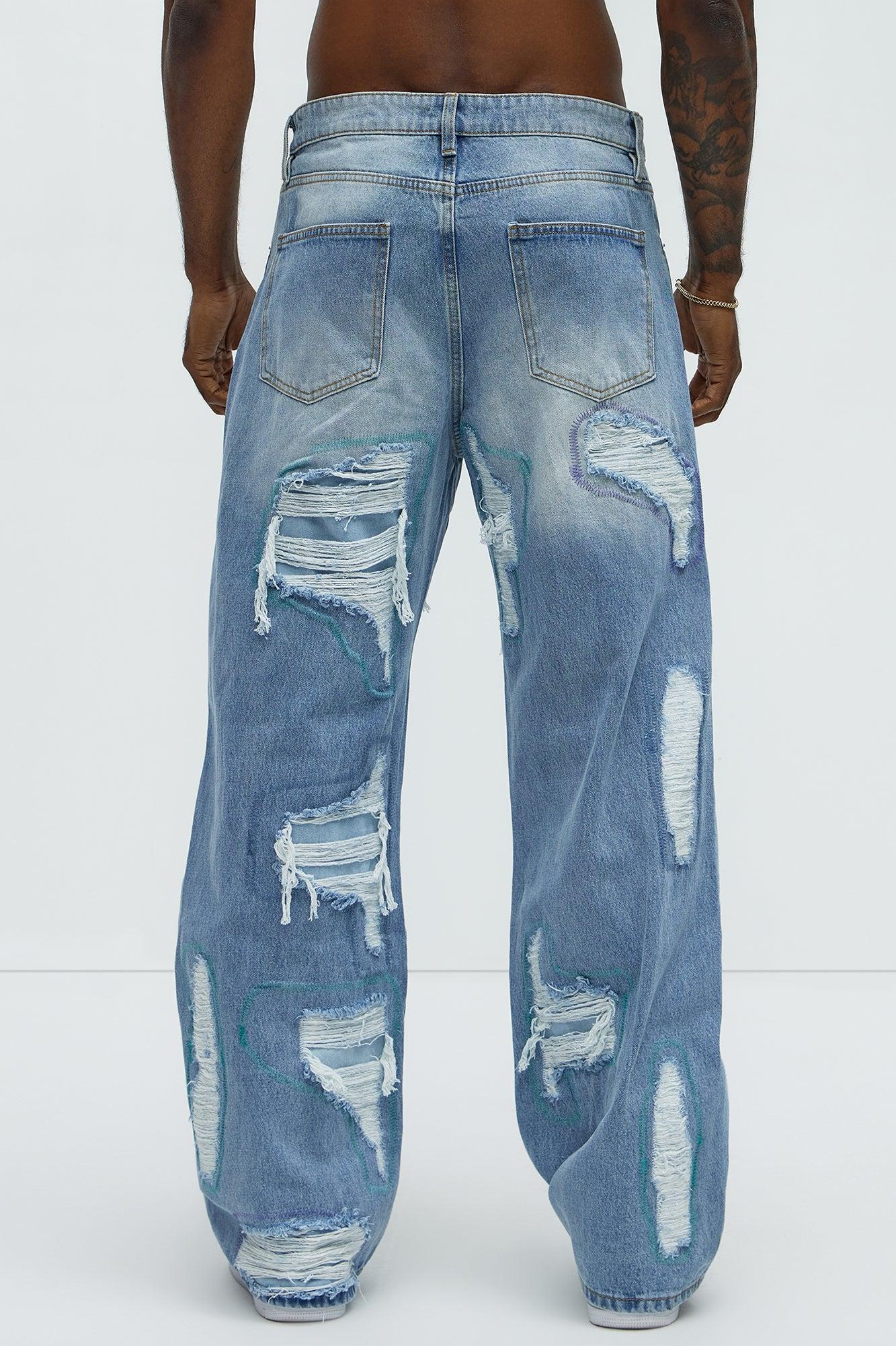 Worn All Over Distressed Baggy Jeans - Light Wash Product Image
