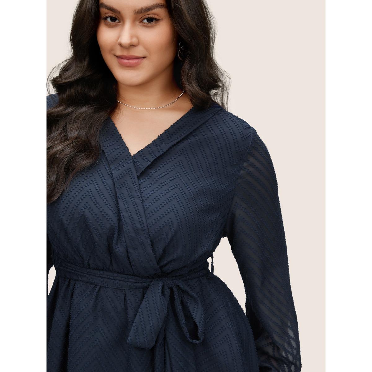 Plus Size Indigo Plain Textured High Low Hem Ties Blouse Women Office Long Sleeve Overlap Collar Office Blouses BloomChic 12/L Product Image