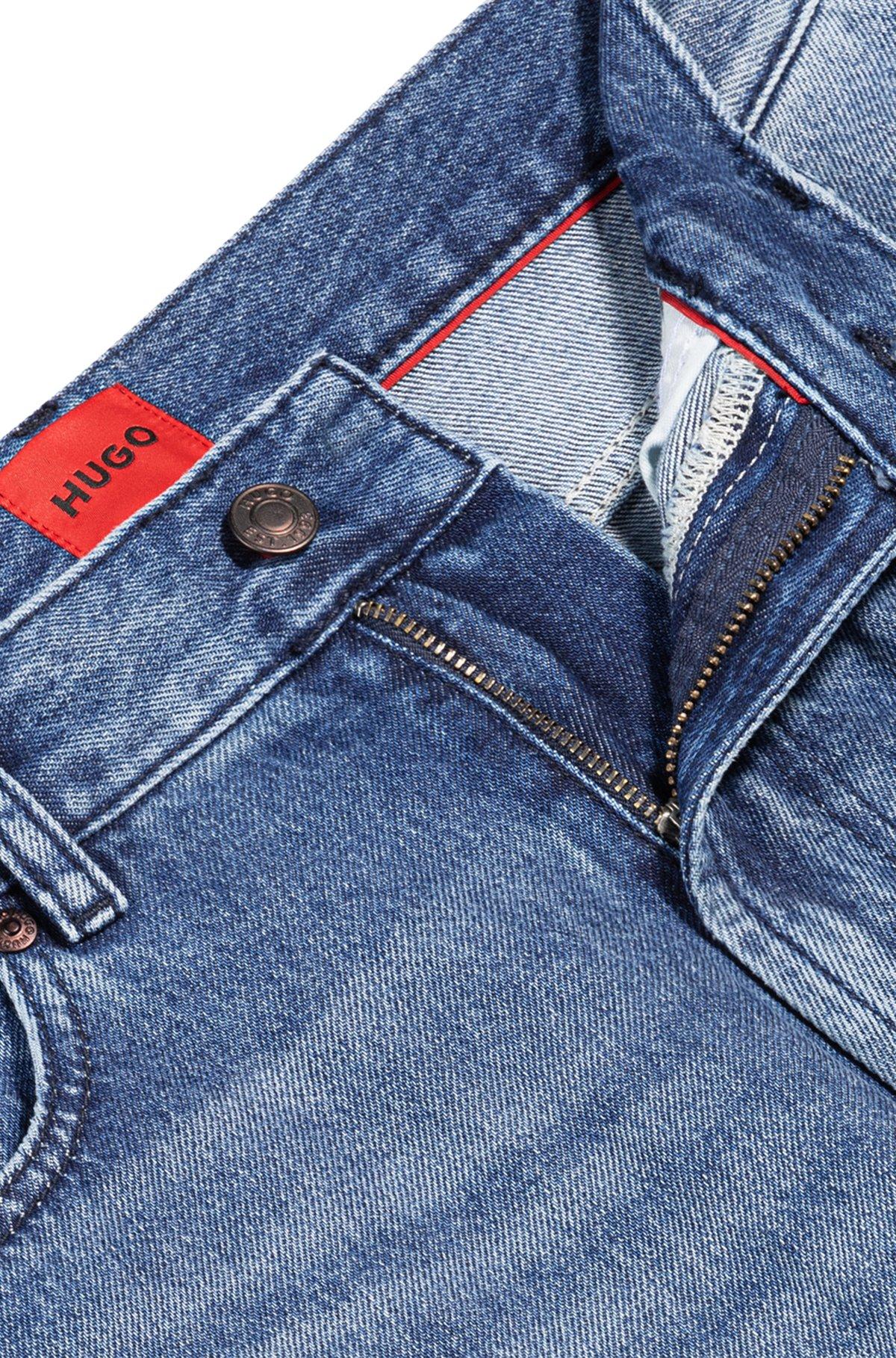 Relaxed tapered-fit jeans in blue vintage-wash denim Product Image