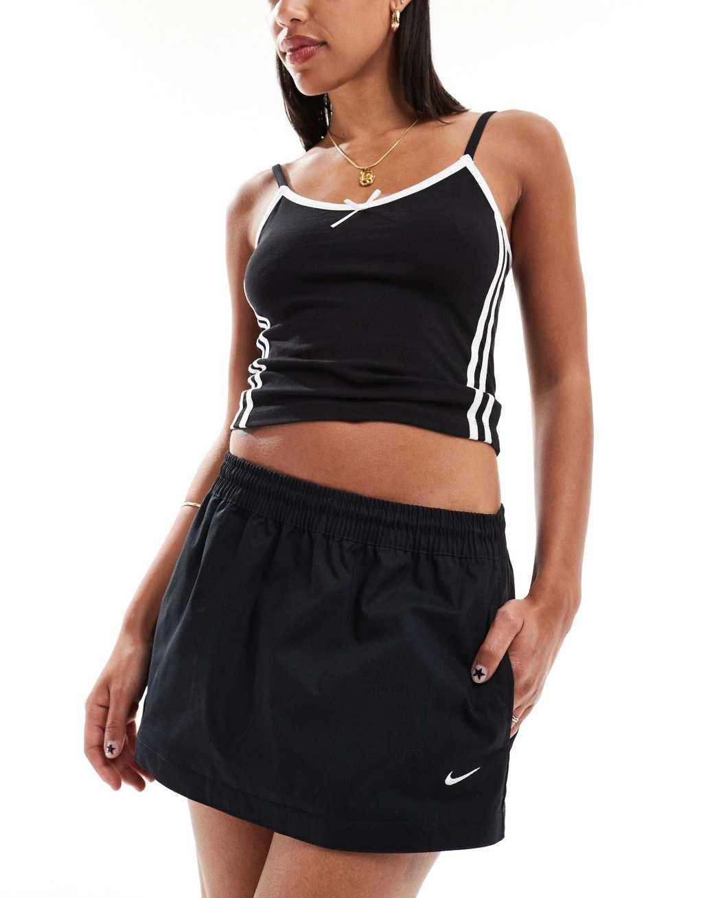 Nike Woven 2 n 1 maxi and mini skirt with zip detail in black Product Image