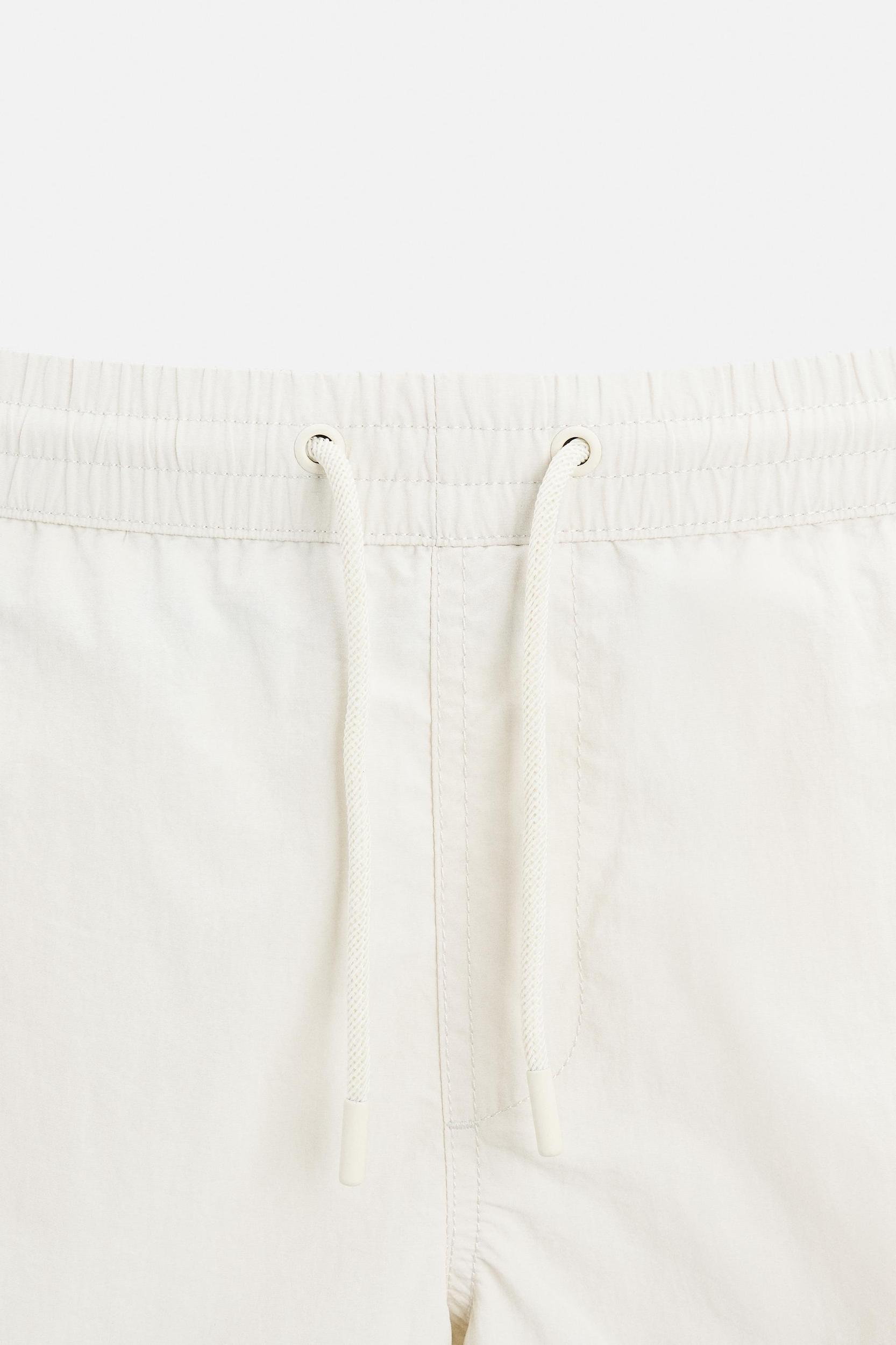 BASIC MID-LENGTH SWIMSUIT Product Image