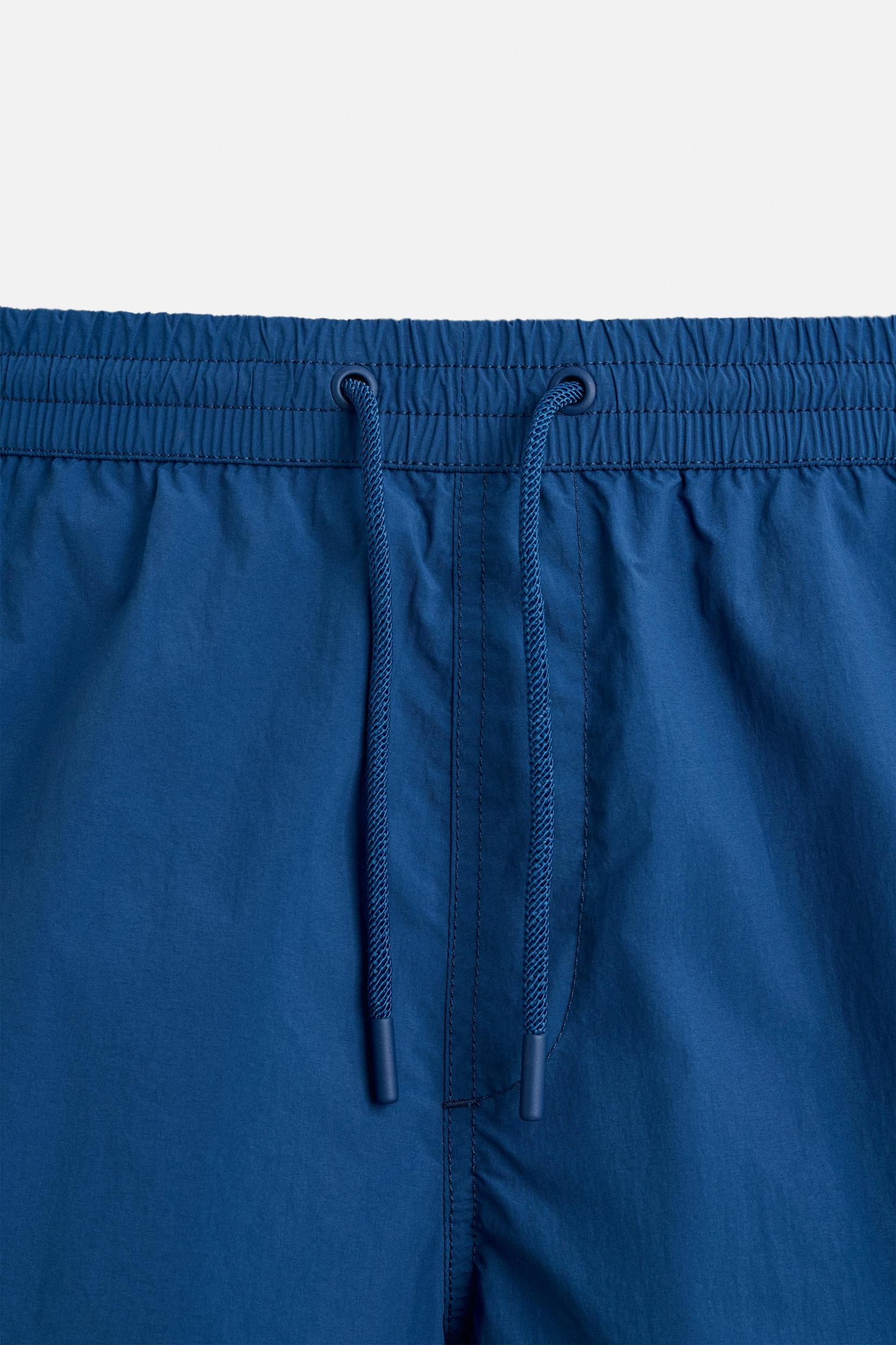 BASIC MID-LENGTH SWIMSUIT Product Image