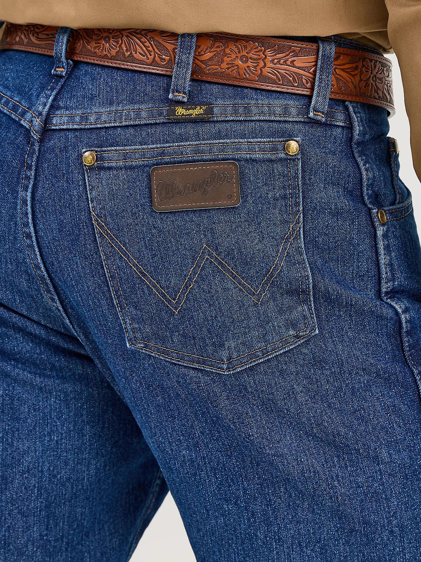 Premium Performance Advanced Comfort Cowboy Cut® Regular Fit Jean | Men's JEANS | Wrangler® Product Image