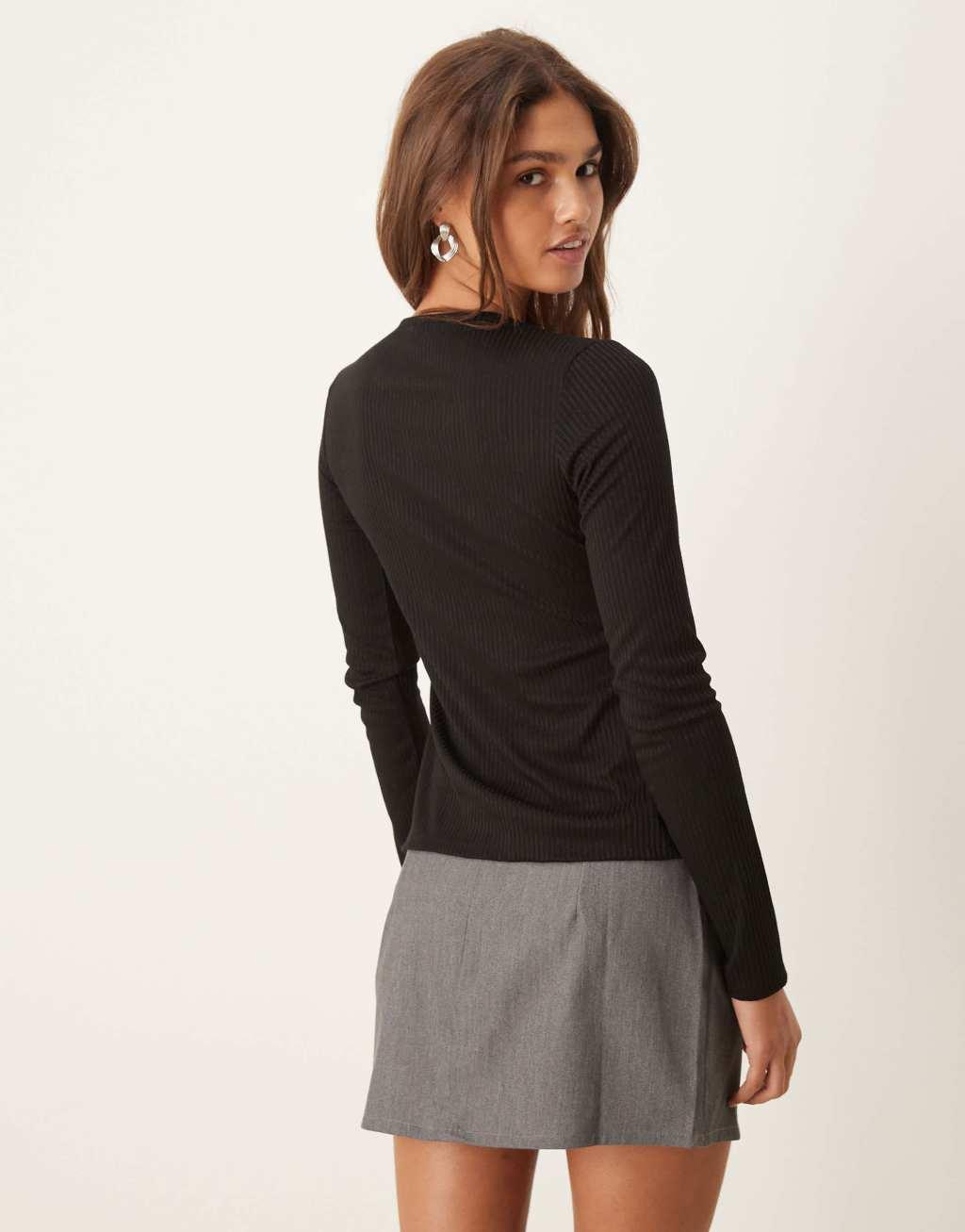 ASOS DESIGN ribbed long sleeve top with gold buttons in black Product Image