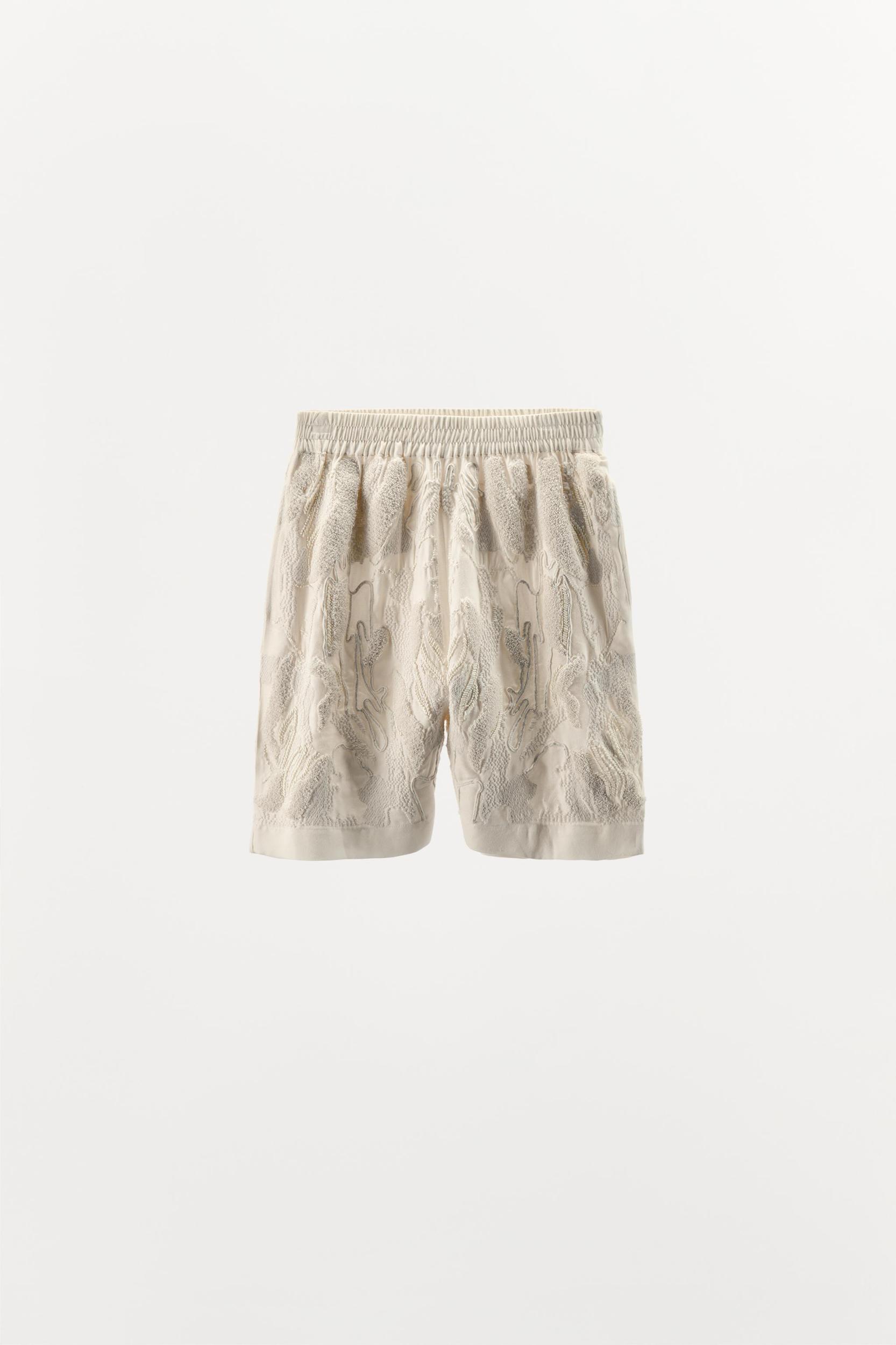 EMBOSSED BEADED TRIANGLE BRA Product Image