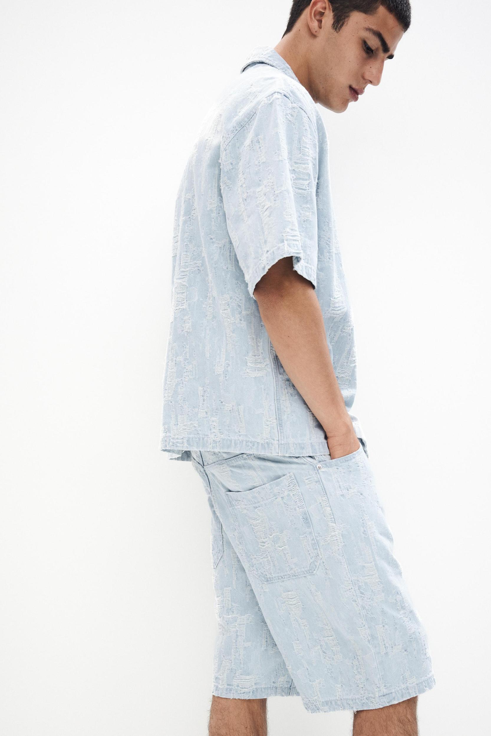 Baggy jacquard denim Bermuda shorts Product Image