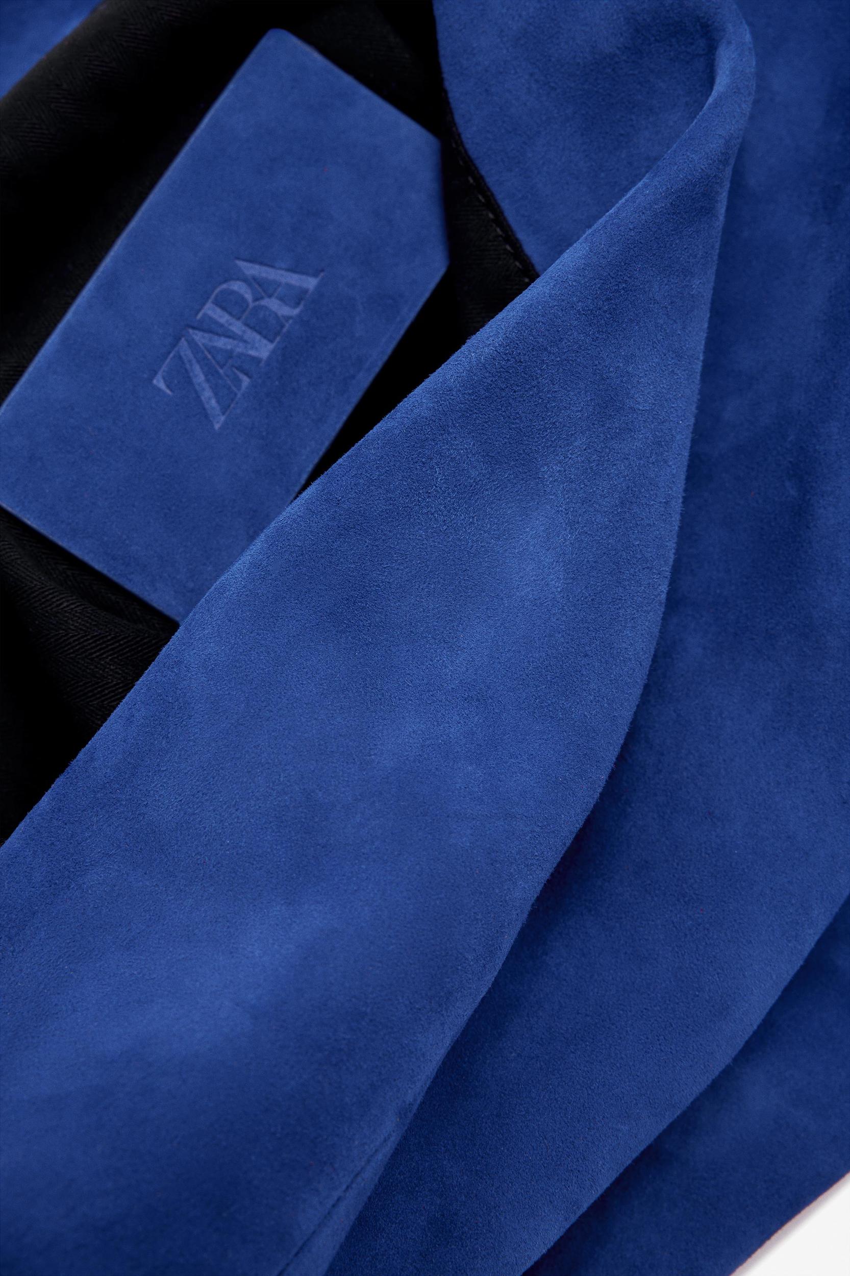 LIMITED EDITION MAXI SUEDE CLUTCH Product Image