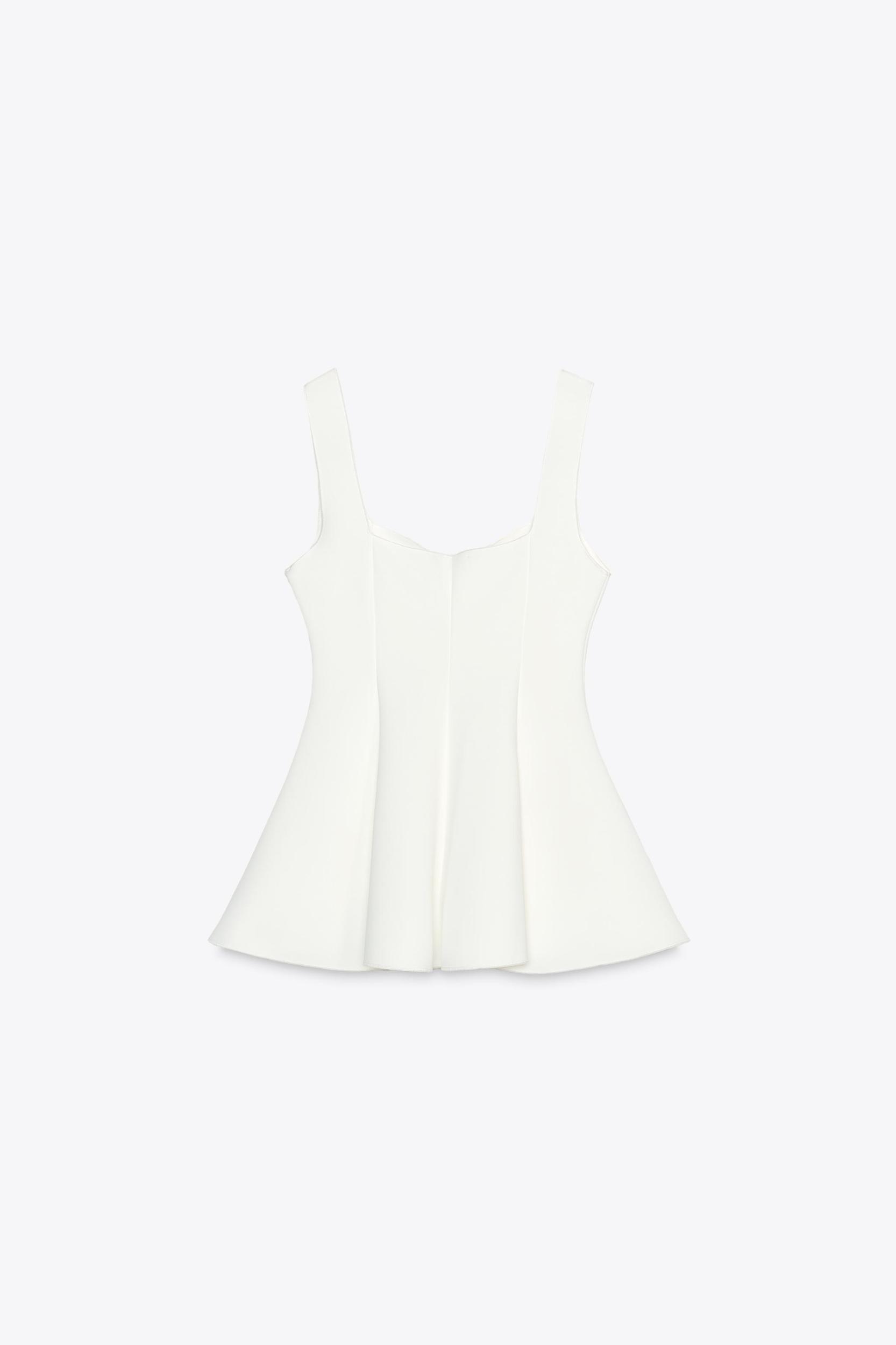 PEPLUM STRETCH TOP Product Image