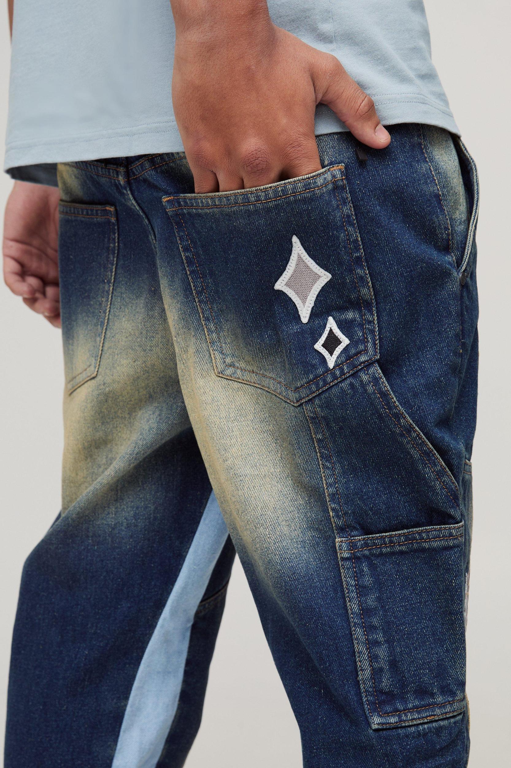 Slim Rigid Flared Carpenter Varsity Badge Gusset Jeans | boohooMAN USA Product Image