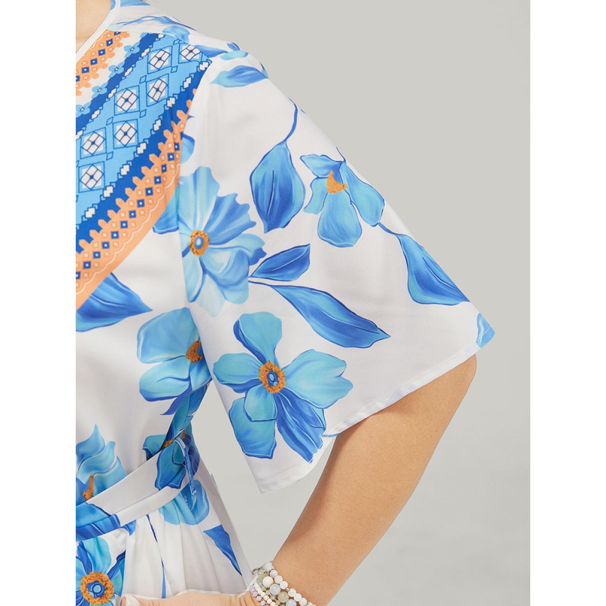 Plus Size Bandana Print Ruffle Hem Belted Pocket Wrap Dress LightBlue Women Vacation Cross straps V-neck Short sleeve Curvy Knee Dress BloomChic 12/L Product Image