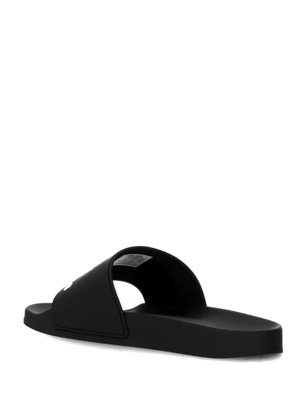 BALENCIAGA Rubber Slide Sandals For The Pool Men In Black White Product Image